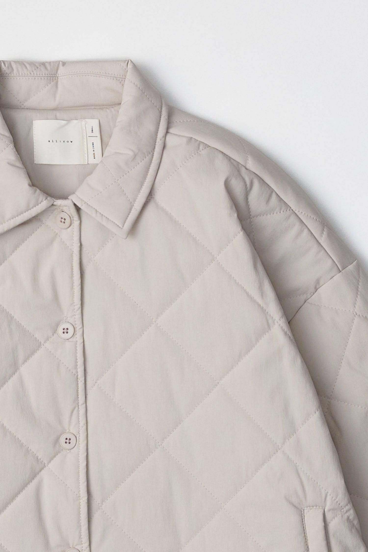 8406248915165, The Cameron Jacket, Outerwear, All Row, Adjustable Cords,autumn,Black,Bone,Buttons,Casual,cf-color-black,cf-color-bone,cf-color-olive,cf-size-l,cf-size-m,cf-size-s,cf-vendor-all-row,Comfortable,Fall,final-sale,finalsale,Front Pockets,Jacket,Layers,Long Sleeve,mid-autumn,modref,new,Olive,Outerwear,Pockets,Quilted,Quilted Jacket,Relaxed,sale,tan,Warm,Winter,Women's,Zipper, Information The Cameron Jacket is an oversized button-down jacket featuring front welt pockets and drop shoulders for a rel