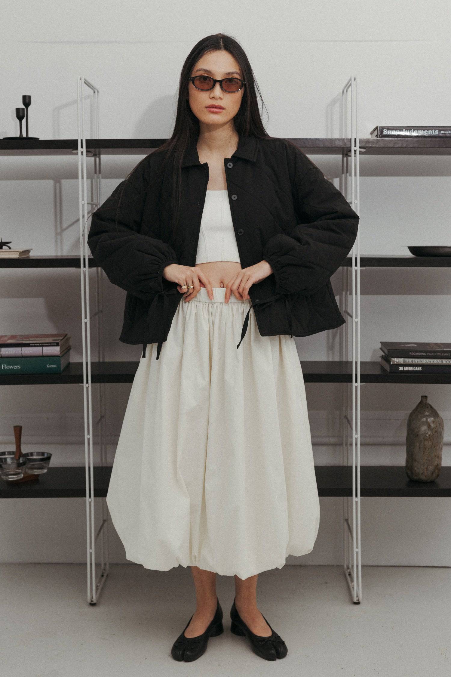 8466464997597, The Bella Skirt, Skirt, All Row, Black,Blue,Bottom,Bottoms,bubble,bubble skirt,cf-color-black,cf-color-natural,cf-size-l,cf-size-m,cf-size-s,Comfortable,Elastic,Elastic Waistband,everyday,flowy,ivory,Light Blue,matching,Midi Skirt,Mod Ref,Skirt,skirts,spring,Summer,womens, Information The Bella Skirt is a playful midi-length bubble skirt. It features an elasticated waist for a comfortable and adjustable fit. The length and bubble effect hem add volume and movement to the silhouette. Pair this