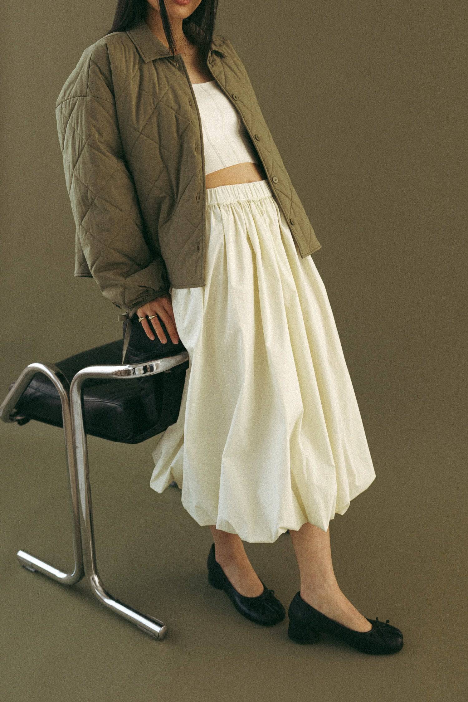 8466464997597, The Bella Skirt, Skirt, All Row, Black,Blue,Bottom,Bottoms,bubble,bubble skirt,cf-color-black,cf-color-natural,cf-size-l,cf-size-m,cf-size-s,Comfortable,Elastic,Elastic Waistband,everyday,flowy,ivory,Light Blue,matching,Midi Skirt,Mod Ref,Skirt,skirts,spring,Summer,womens, Information The Bella Skirt is a playful midi-length bubble skirt. It features an elasticated waist for a comfortable and adjustable fit. The length and bubble effect hem add volume and movement to the silhouette. Pair this