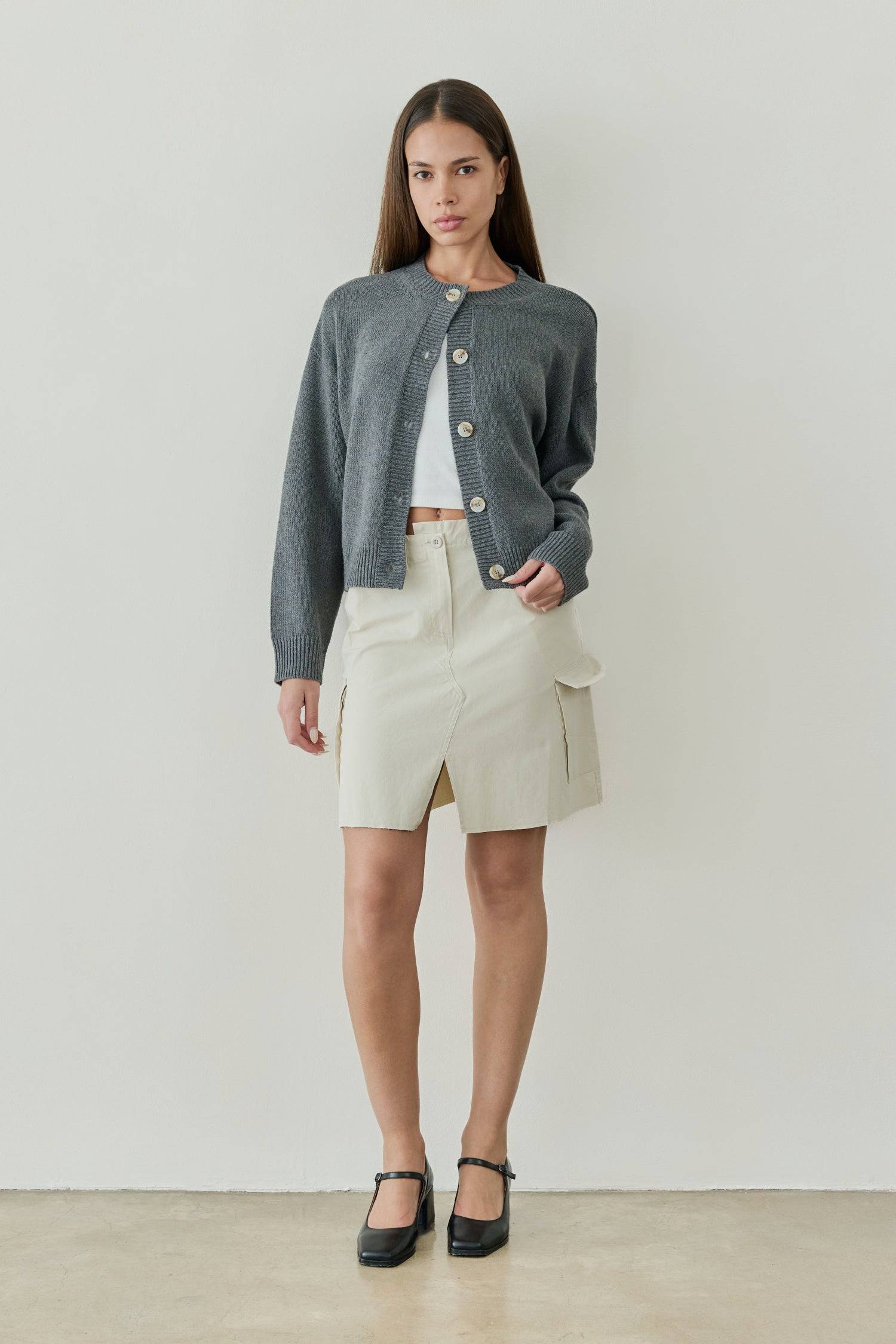 8809523183837, The Lucy Cardigan, Tops, All Row, All Row,allrow,Black,brown,Button Down Shirt,Button up,buttons,Cardigan,cf-color-black,cf-color-brown,cf-size-l,cf-size-m,cf-size-s,Comfortable,Crew Neck,Crew Neckline,Everyday,longsleeve,Matching Set,set,Sets,stretch,Stretchy,taupe,tonal buttons,Transitional,Womens,womens top, Information The Lucy Cardigan is a semi-cropped cardigan with a boxy fit and drop shoulder, crafted from a mid-weight knit fabric for optimal warmth. Perfect for layering with high-wai