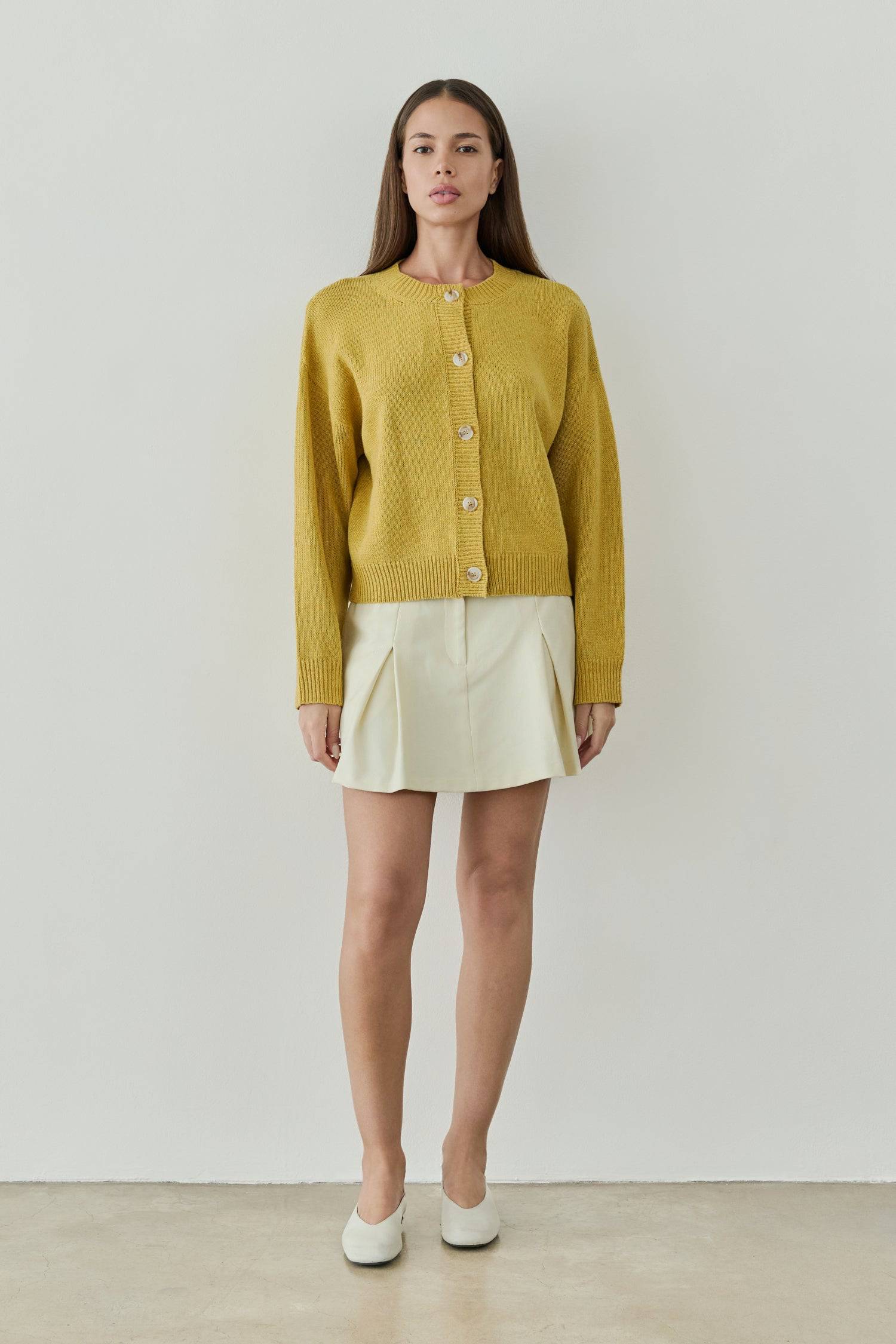 8809523183837, The Lucy Cardigan, Tops, All Row, All Row,allrow,Black,brown,Button Down Shirt,Button up,buttons,Cardigan,cf-color-black,cf-color-brown,cf-size-l,cf-size-m,cf-size-s,Comfortable,Crew Neck,Crew Neckline,Everyday,longsleeve,Matching Set,set,Sets,stretch,Stretchy,taupe,tonal buttons,Transitional,Womens,womens top, Information The Lucy Cardigan is a semi-cropped cardigan with a boxy fit and drop shoulder, crafted from a mid-weight knit fabric for optimal warmth. Perfect for layering with high-wai