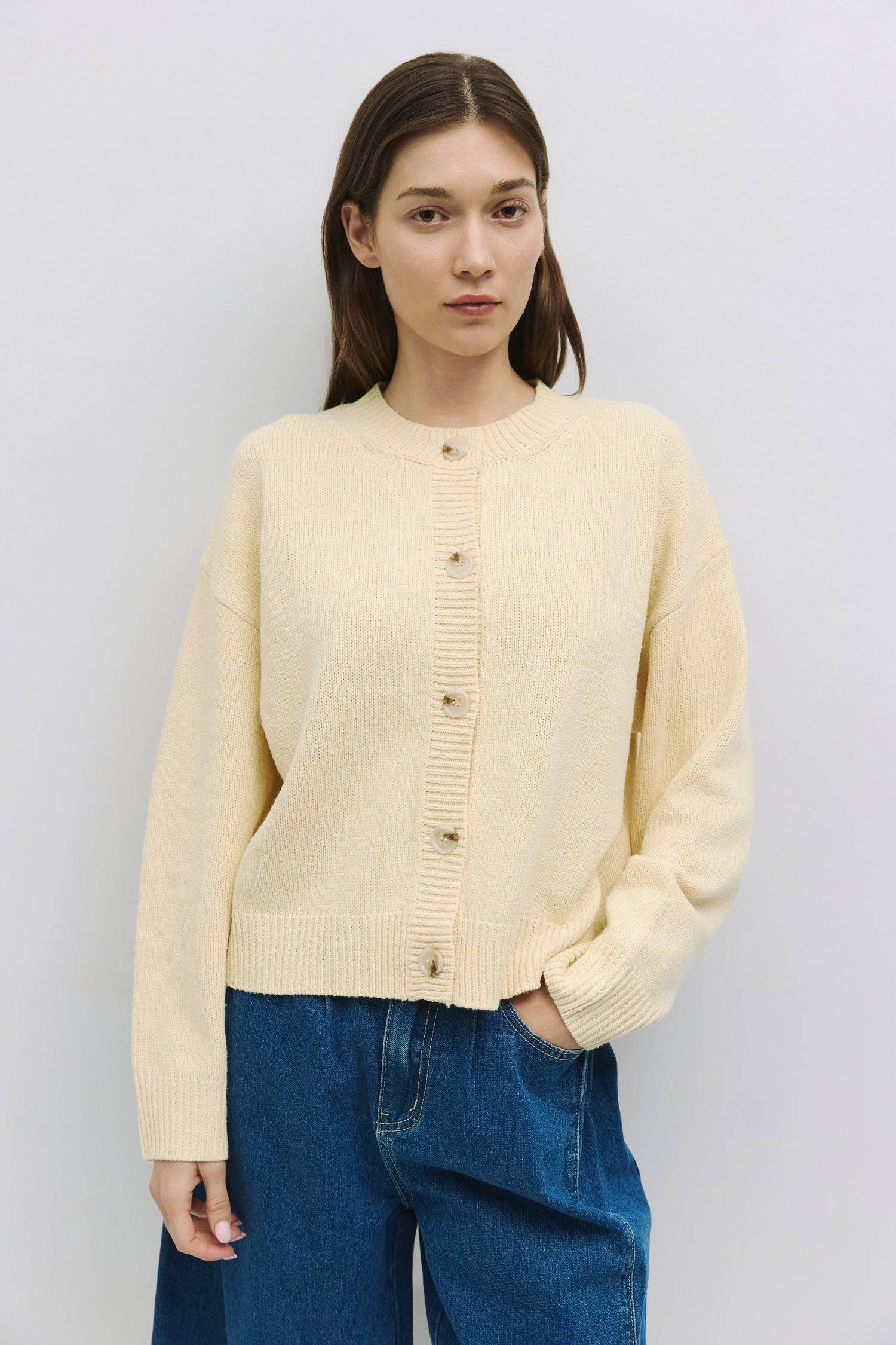 8809523183837, The Lucy Cardigan, Tops, All Row, All Row,allrow,Black,brown,Button Down Shirt,Button up,buttons,Cardigan,cf-color-black,cf-color-brown,cf-size-l,cf-size-m,cf-size-s,Comfortable,Crew Neck,Crew Neckline,Everyday,longsleeve,Matching Set,set,Sets,stretch,Stretchy,taupe,tonal buttons,Transitional,Womens,womens top, Information The Lucy Cardigan is a semi-cropped cardigan with a boxy fit and drop shoulder, crafted from a mid-weight knit fabric for optimal warmth. Perfect for layering with high-wai