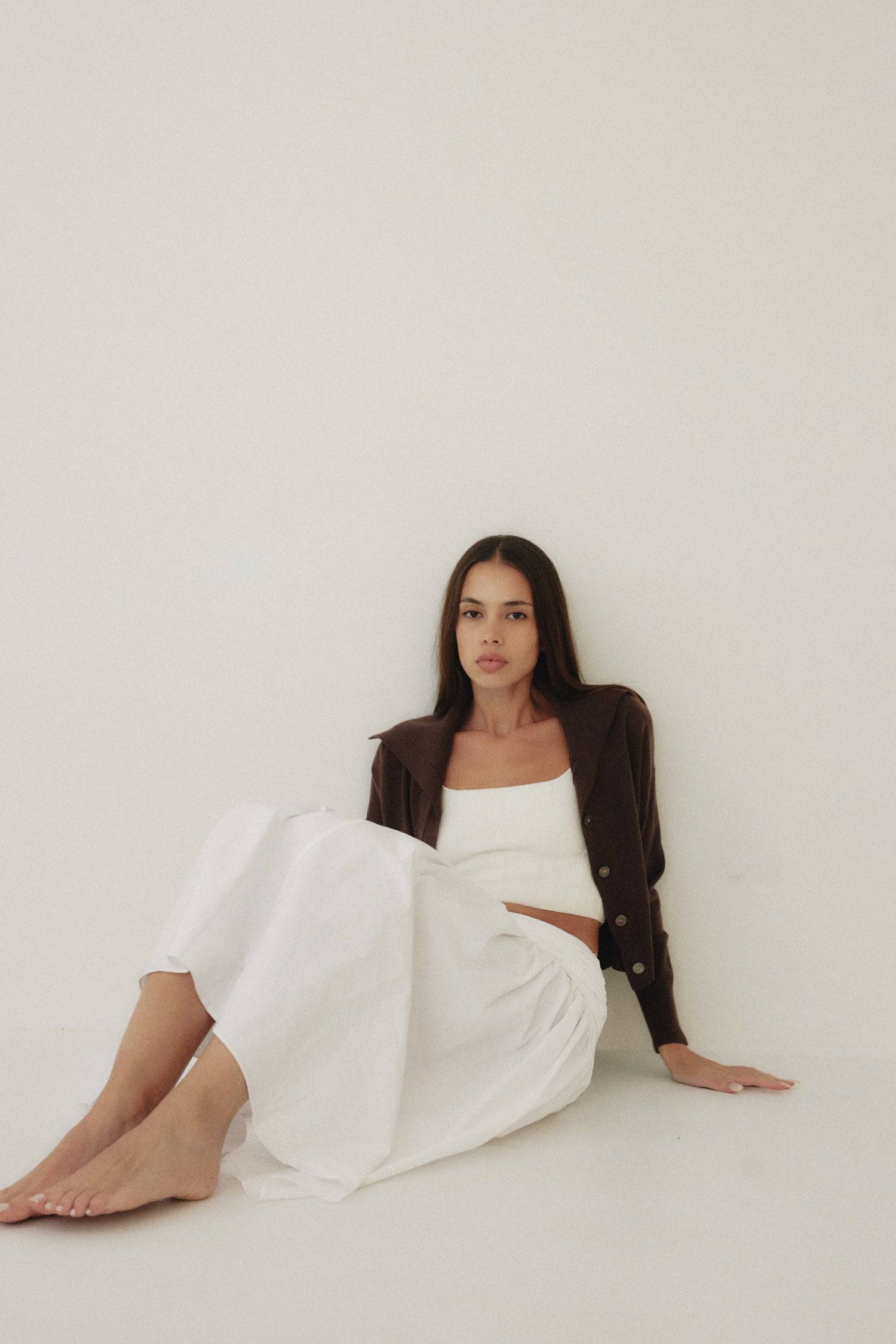 8302393393373, The Mariana Skirt, Bottoms, All Row, beige,Black,Bottom,Bottoms,Breathable,cf-color-black,cf-color-white,cf-size-l,cf-size-m,cf-size-s,cf-vendor-all-row,Comfortable,everyday,flowy,High Waist,Lime,Matching Set,Midi Skirt,POPLIN,Relaxed Fit,ruched,ruching,Semi-Formal,set,Sets,Skirt,spring,Summer,versatile,white,womens, Information The Mariana Skirt is an elevated midi skirt with wrap detailing at the waistline. It features a full, flowing design and an invisible back zipper for a seamless finis