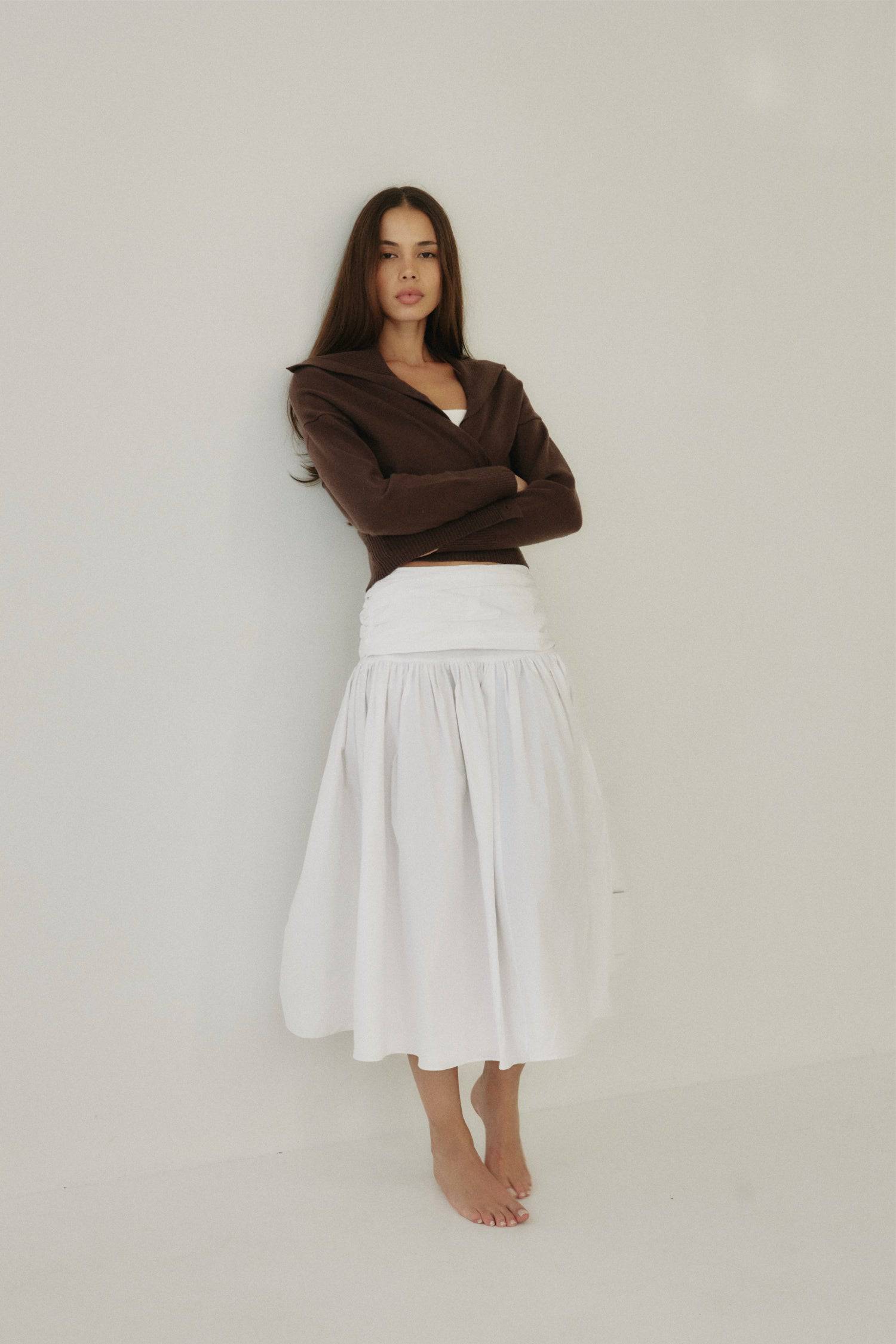 8302393393373, The Mariana Skirt, Bottoms, All Row, beige,Black,Bottom,Bottoms,Breathable,cf-color-black,cf-color-white,cf-size-l,cf-size-m,cf-size-s,cf-vendor-all-row,Comfortable,everyday,flowy,High Waist,Lime,Matching Set,Midi Skirt,POPLIN,Relaxed Fit,ruched,ruching,Semi-Formal,set,Sets,Skirt,spring,Summer,versatile,white,womens, Information The Mariana Skirt is an elevated midi skirt with wrap detailing at the waistline. It features a full, flowing design and an invisible back zipper for a seamless finis