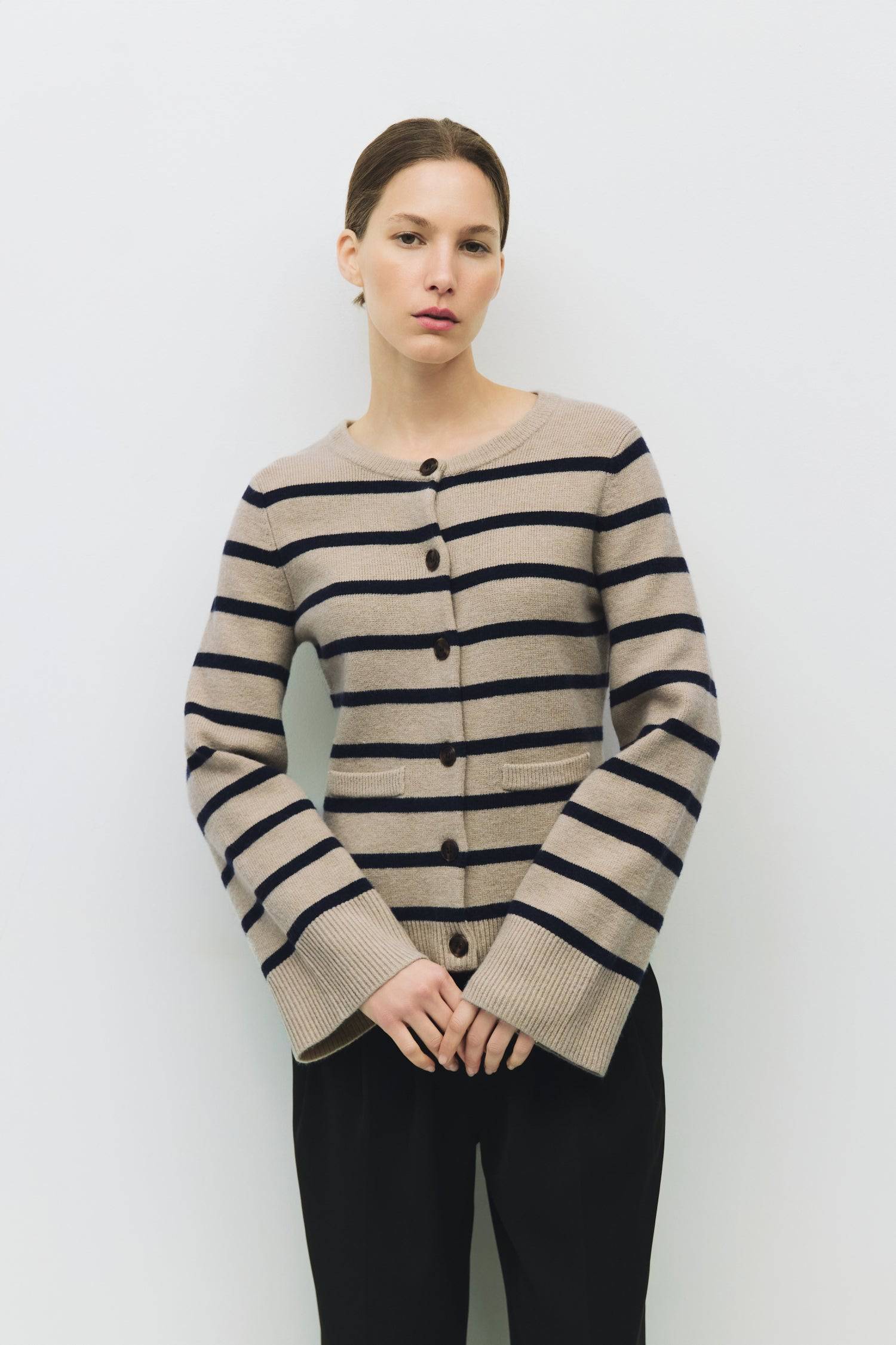 8983737860317, The Cindy Cardigan, Outerwear, Mod Ref, Acrylic,beige,bell sleeves,Black,Button up,Cardigan,Casual,cf-color-beige,cf-color-black,cf-color-oatmeal,cf-size-l,cf-size-m,cf-size-s,cf-size-xl,cf-size-xs,cf-vendor-mod-ref,Colder Seasons,Collar,collared,Cotton,fall,heavy weight,Knit,Matching Set,Mod Ref,modref,new,nylon,Oatmeal,polyester,Pullover,Rib Knit,semi-cropped,set,Sets,shawl,shawl collar,Soft Knit,tonal,Transitional,winter,Women's, Information The Cindy Cardigan is a striped button-up with a