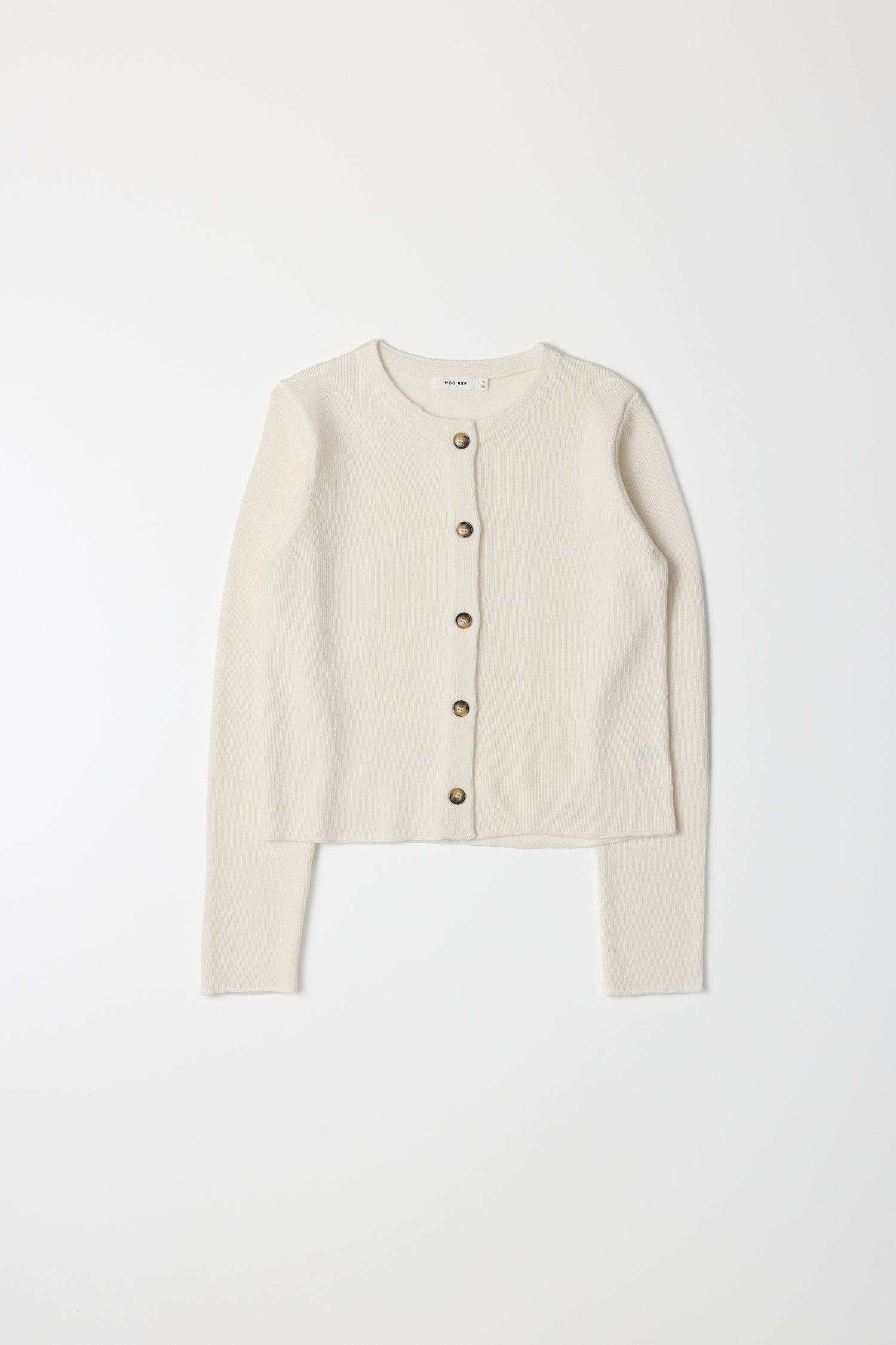 8364338381021, The Molly Cardigan, Outerwear, Mod Ref, Acrylic,beige,Blue,Cardigan,Casual,cf-color-beige,cf-color-blue,cf-color-grey,cf-color-sage,cf-size-l,cf-size-m,cf-size-s,cf-size-xl,cf-size-xs,cf-vendor-mod-ref,Cropped,cropped hemline,Everyday,fall,Grey,Heather Grey,Mod Ref,modref,new,polyester,polyurethane,Pullover,Sage,set,Sets,Sweater,Transitional,Women's, Information The Molly Cardigan is a chic light-weight knit cardigan. The cropped length offers a modern touch to a classic design. It also featu