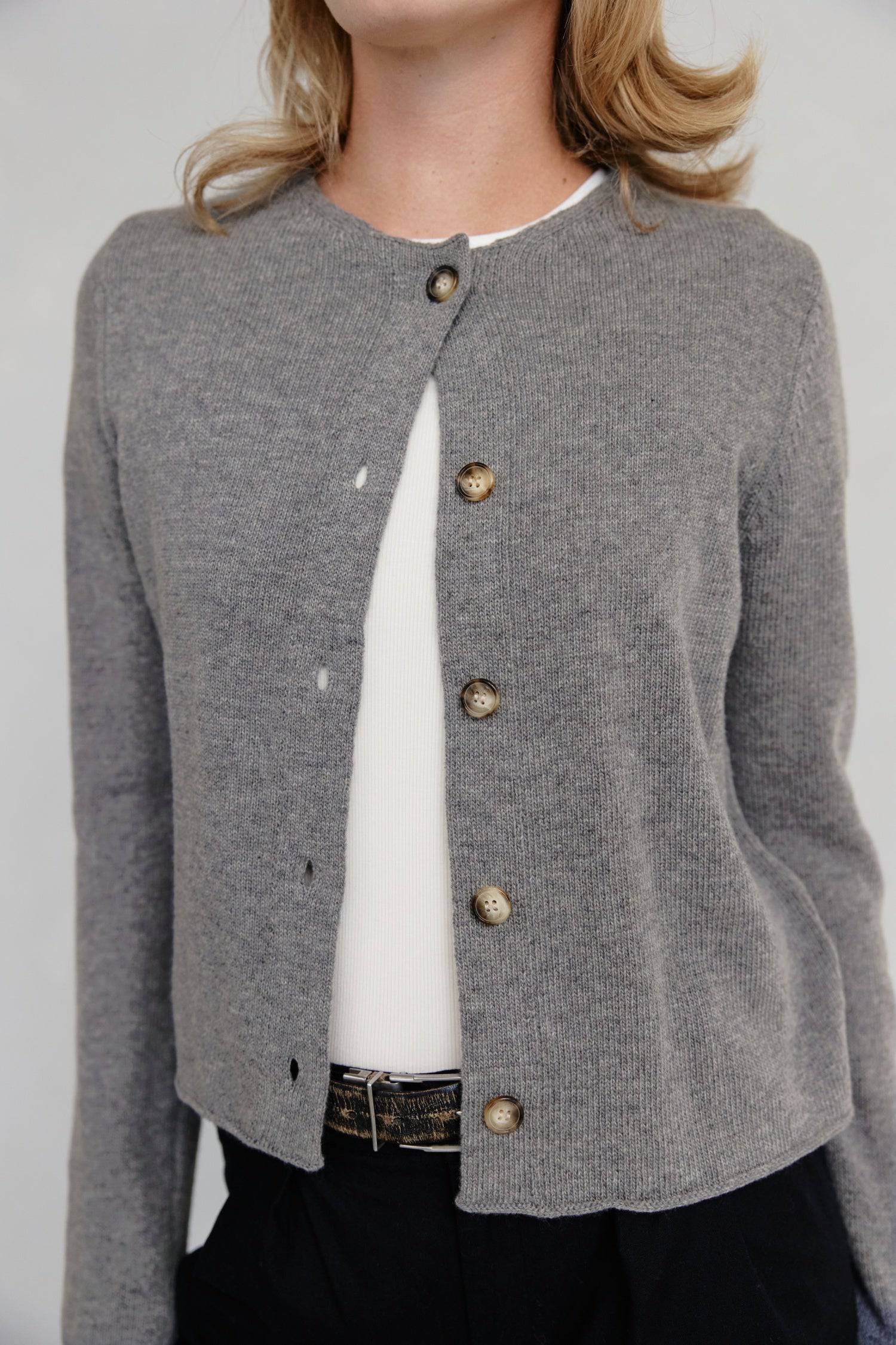 8364338381021, The Molly Cardigan, Outerwear, Mod Ref, Acrylic,beige,Blue,Cardigan,Casual,cf-color-beige,cf-color-blue,cf-color-grey,cf-color-sage,cf-size-l,cf-size-m,cf-size-s,cf-size-xl,cf-size-xs,cf-vendor-mod-ref,Cropped,cropped hemline,Everyday,fall,Grey,Heather Grey,Mod Ref,modref,new,polyester,polyurethane,Pullover,Sage,set,Sets,Sweater,Transitional,Women's, Information The Molly Cardigan is a chic light-weight knit cardigan. The cropped length offers a modern touch to a classic design. It also featu