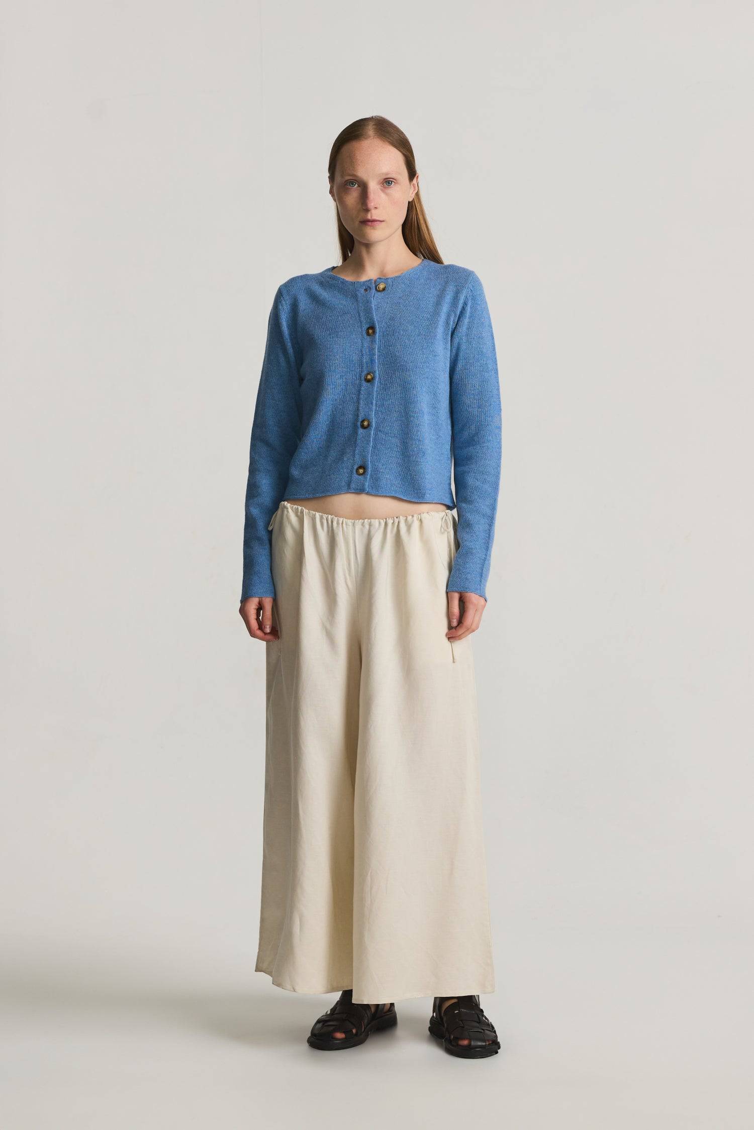 8364338381021, The Molly Cardigan, Outerwear, Mod Ref, Acrylic,beige,Blue,Cardigan,Casual,cf-color-beige,cf-color-blue,cf-color-grey,cf-color-sage,cf-size-l,cf-size-m,cf-size-s,cf-size-xl,cf-size-xs,cf-vendor-mod-ref,Cropped,cropped hemline,Everyday,fall,Grey,Heather Grey,Mod Ref,modref,new,polyester,polyurethane,Pullover,Sage,set,Sets,Sweater,Transitional,Women's, Information The Molly Cardigan is a chic light-weight knit cardigan. The cropped length offers a modern touch to a classic design. It also featu