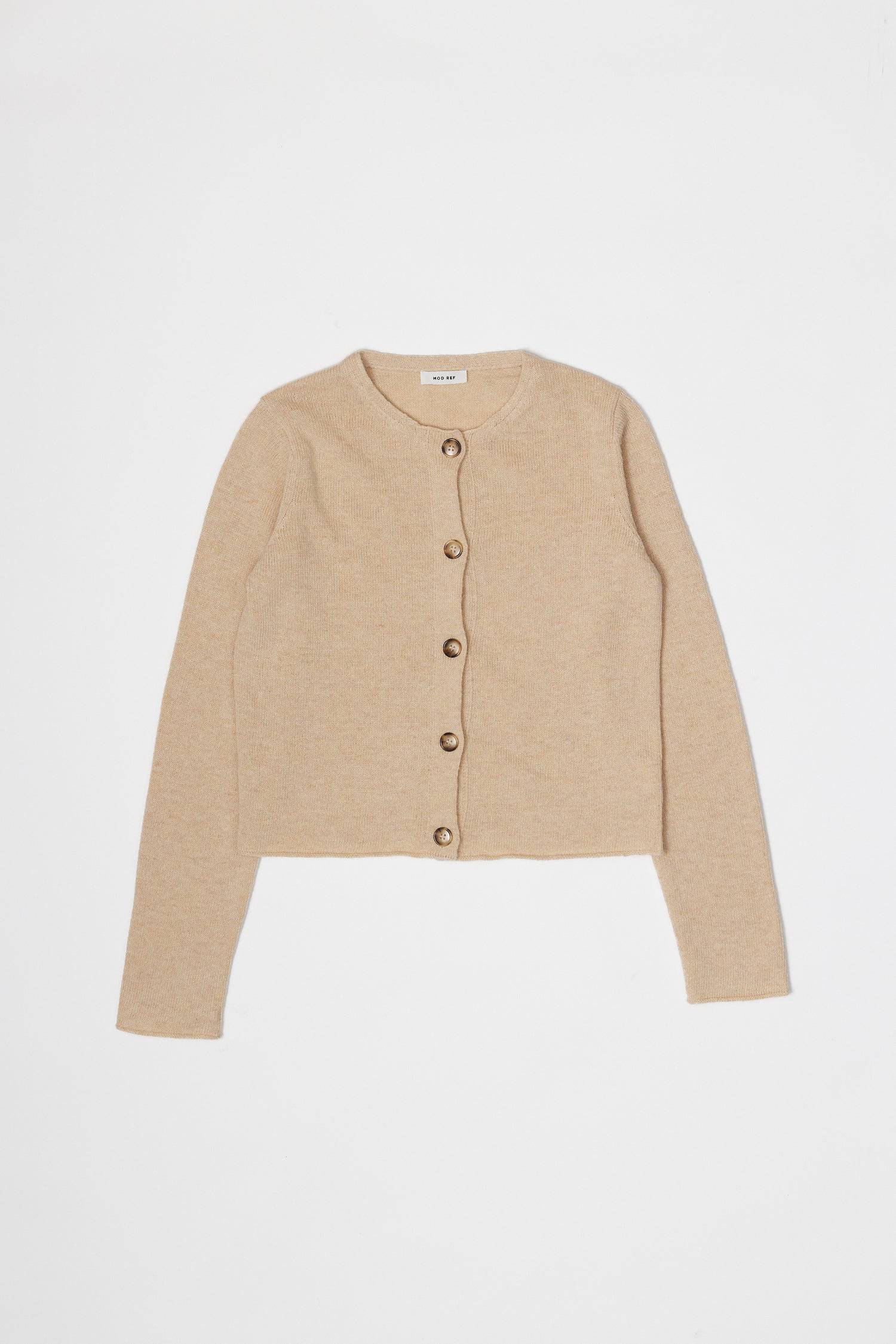 8364338381021, The Molly Cardigan, Outerwear, Mod Ref, Acrylic,beige,Blue,Cardigan,Casual,cf-color-beige,cf-color-blue,cf-color-grey,cf-color-sage,cf-size-l,cf-size-m,cf-size-s,cf-size-xl,cf-size-xs,cf-vendor-mod-ref,Cropped,cropped hemline,Everyday,fall,Grey,Heather Grey,Mod Ref,modref,new,polyester,polyurethane,Pullover,Sage,set,Sets,Sweater,Transitional,Women's, Information The Molly Cardigan is a chic light-weight knit cardigan. The cropped length offers a modern touch to a classic design. It also featu