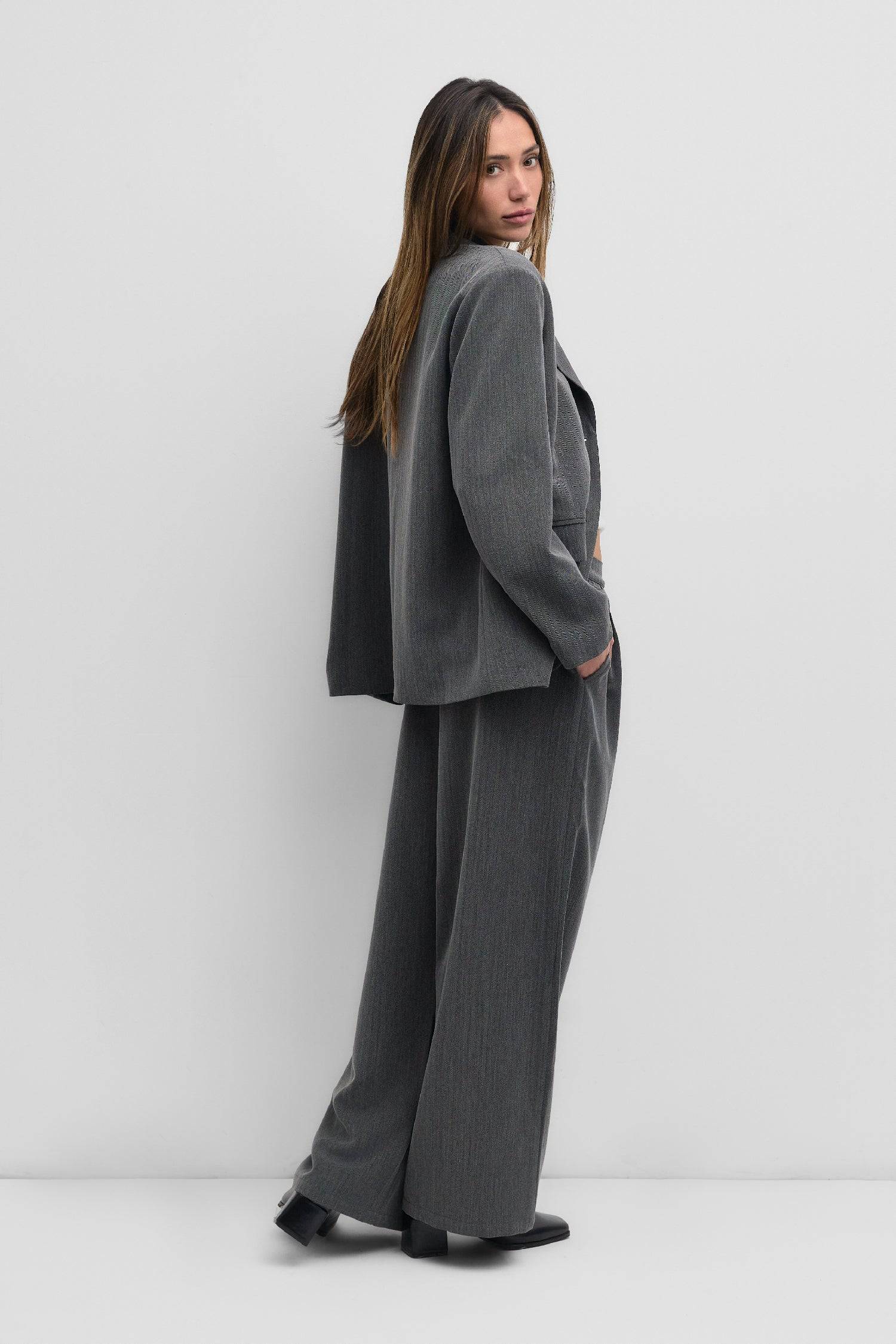 8722346115293, The Kerry Blazer, Outerwear, Mod Ref, Black,Blazer,brown,Casual,cf-color-black,cf-color-brown,cf-size-l,cf-size-m,cf-size-s,cf-vendor-mod-ref,Comfortable,Everyday,Fall,herringbone,layering,Lining,Matching Set,new,Outerwear,Oversized,padded shoulders,Polyester,rayon,semi formal,Semi-Casual,set,Sets,tailored,Transitional,Womens, Information The Kerry Blazer is a classic single-breasted herringbone blazer designed with shoulder pads for a more structured silhouette. Pair it with The Kerry Pants