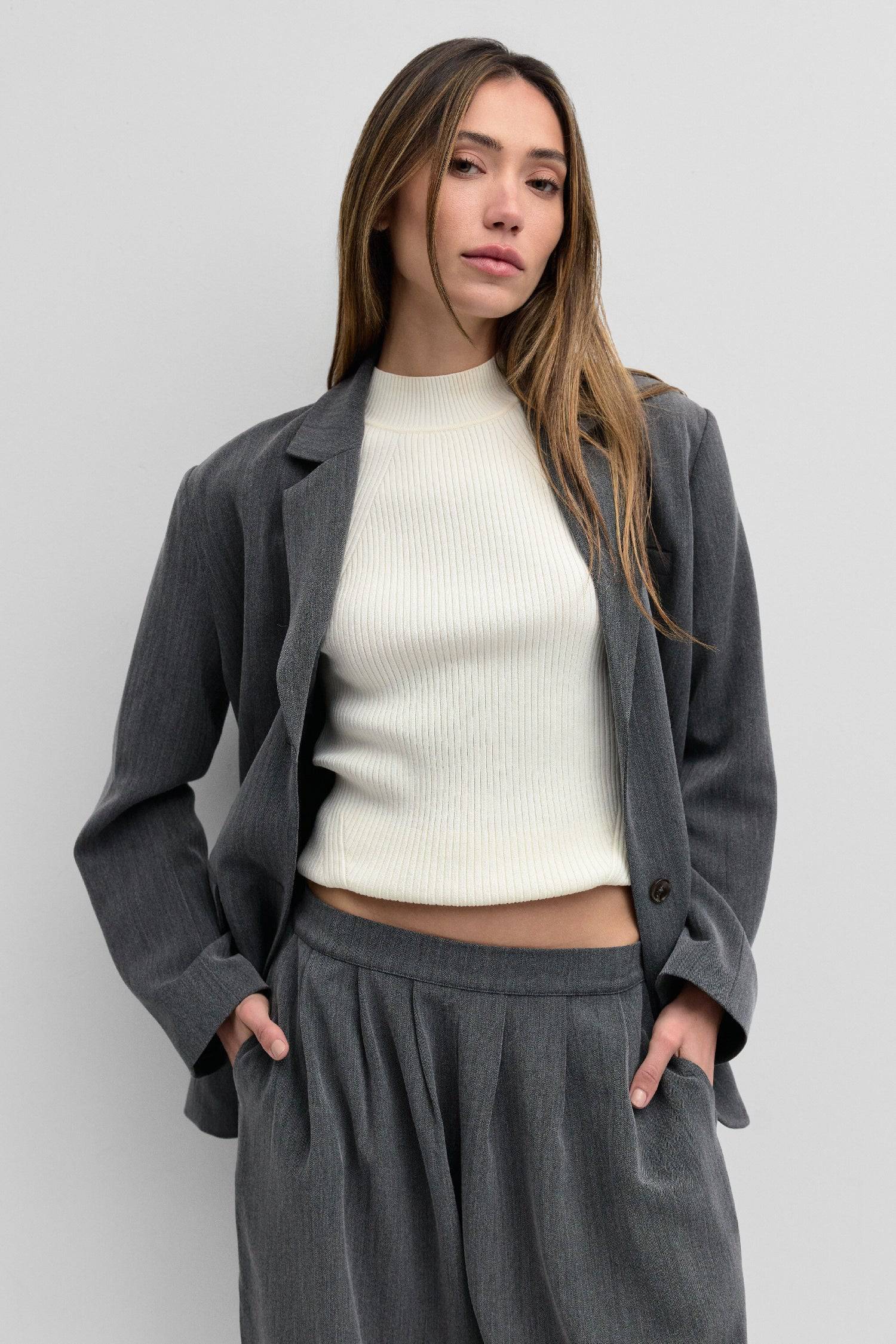 8722346115293, The Kerry Blazer, Outerwear, Mod Ref, Black,Blazer,brown,Casual,cf-color-black,cf-color-brown,cf-size-l,cf-size-m,cf-size-s,cf-vendor-mod-ref,Comfortable,Everyday,Fall,herringbone,layering,Lining,Matching Set,new,Outerwear,Oversized,padded shoulders,Polyester,rayon,semi formal,Semi-Casual,set,Sets,tailored,Transitional,Womens, Information The Kerry Blazer is a classic single-breasted herringbone blazer designed with shoulder pads for a more structured silhouette. Pair it with The Kerry Pants