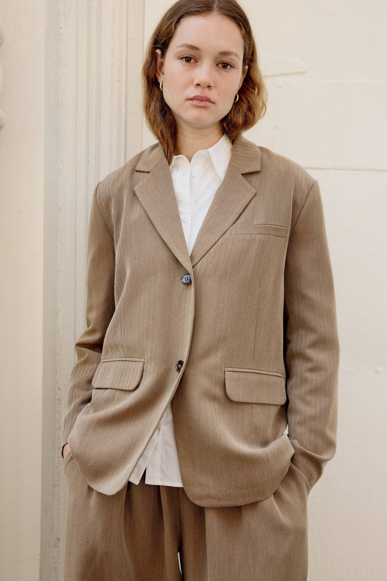 8722346115293, The Kerry Blazer, Outerwear, Mod Ref, Black,Blazer,brown,Casual,cf-color-black,cf-color-brown,cf-size-l,cf-size-m,cf-size-s,cf-vendor-mod-ref,Comfortable,Everyday,Fall,herringbone,layering,Lining,Matching Set,new,Outerwear,Oversized,padded shoulders,Polyester,rayon,semi formal,Semi-Casual,set,Sets,tailored,Transitional,Womens, Information The Kerry Blazer is a classic single-breasted herringbone blazer designed with shoulder pads for a more structured silhouette. Pair it with The Kerry Pants