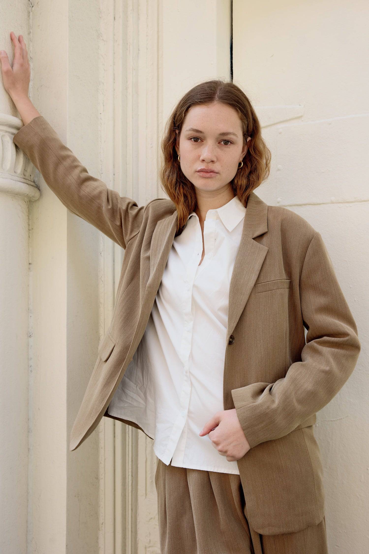 8722346115293, The Kerry Blazer, Outerwear, Mod Ref, Black,Blazer,brown,Casual,cf-color-black,cf-color-brown,cf-size-l,cf-size-m,cf-size-s,cf-vendor-mod-ref,Comfortable,Everyday,Fall,herringbone,layering,Lining,Matching Set,new,Outerwear,Oversized,padded shoulders,Polyester,rayon,semi formal,Semi-Casual,set,Sets,tailored,Transitional,Womens, Information The Kerry Blazer is a classic single-breasted herringbone blazer designed with shoulder pads for a more structured silhouette. Pair it with The Kerry Pants