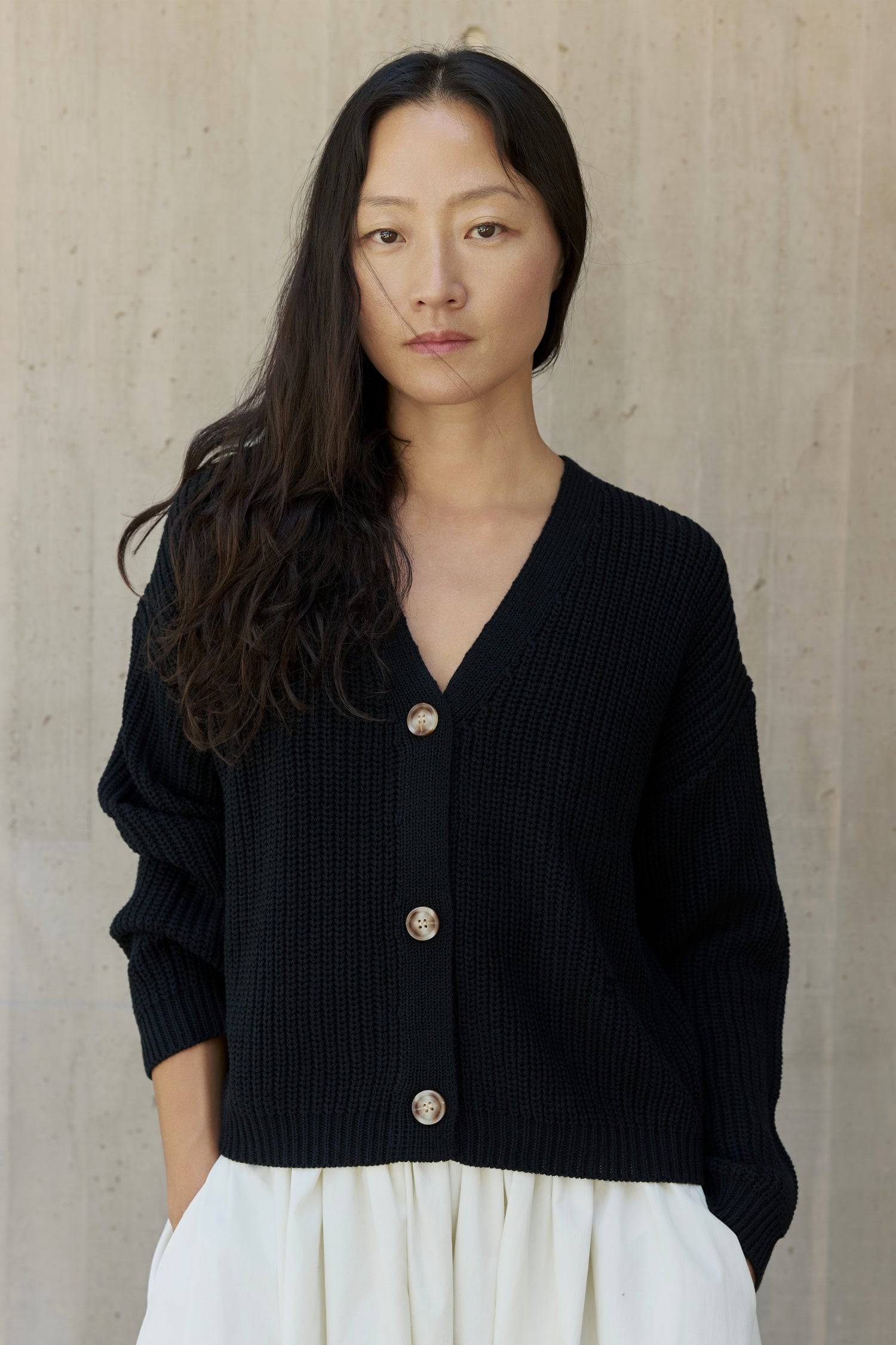 8831739330781, The Willow Cardigan, Tops, Mod Ref, Basic,Basics,Black,Blue,Cardigan,Casual,cf-color-black,cf-color-blue,cf-size-l,cf-size-m,cf-size-s,cf-vendor-mod-ref,Collar,collared,Collared Top,Comfort,Comfortable,Contemporary,Cotton,Everyday,Fall,final-sale,finalsale,fundraiser,Grey,layering,Layers,Minimal,minimalist,Mod Ref,modref,new,Oversized,sale,Sweater,Sweater Top,Tops,v neckline,Winter,Womens,Wool, Information The Willow Cardigan is a chunky v-neck cardigan complete with a fisherman knit and semi