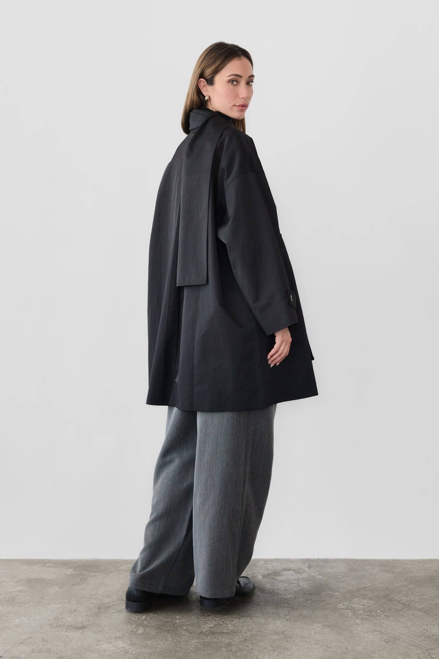 8828669198557, The Cove Coat, Outerwear, Mod Ref, attached scarf,Black,cf-color-black,cf-color-khaki,cf-size-l,cf-size-m,cf-size-s,cf-vendor-mod-ref,Coat,coat jacket,Comfort,Comfortable,Detail,Details,Fall,layer,layering,Layers,Long,Long Sleeve,modref,new,Outerwear,Oversized,Oversized Coat,Peacoat,Pockets,scarf,Spring,Summer,Transitional,Trench,Trench Coat,Womens, Information The Cove Coat offers an effortless chic style. It sits slightly below the hips for a trendy look and includes an attachable scarf for