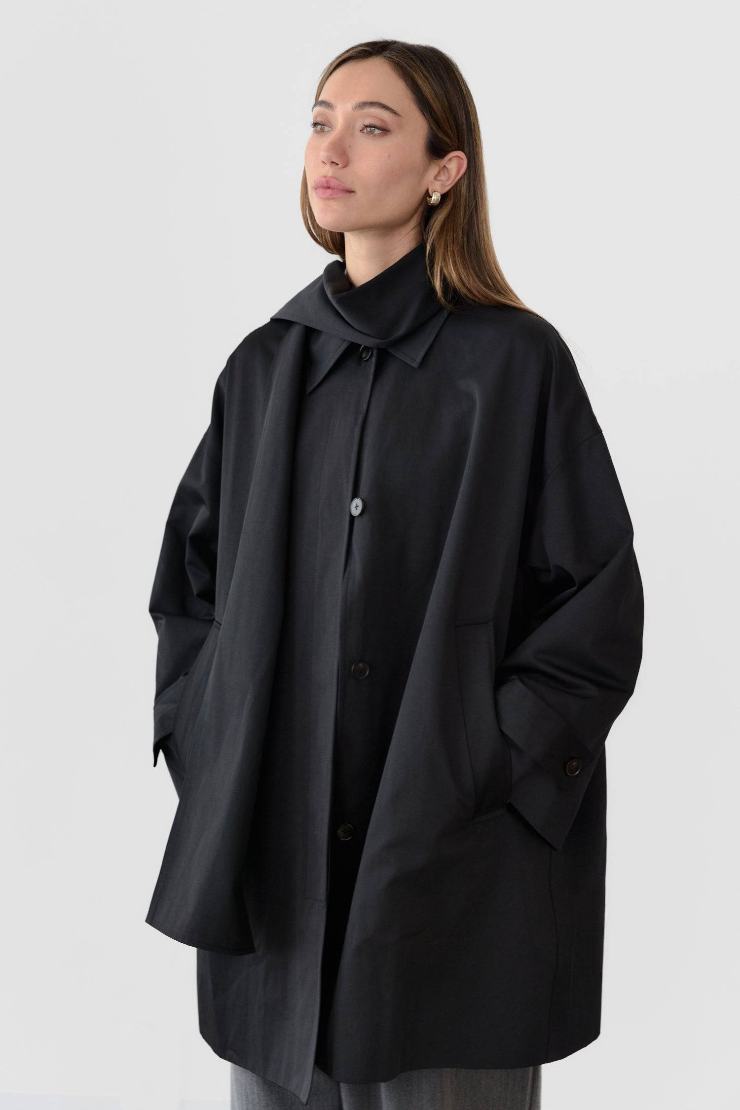 8828669198557, The Cove Coat, Outerwear, Mod Ref, attached scarf,Black,cf-color-black,cf-color-khaki,cf-size-l,cf-size-m,cf-size-s,cf-vendor-mod-ref,Coat,coat jacket,Comfort,Comfortable,Detail,Details,Fall,layer,layering,Layers,Long,Long Sleeve,modref,new,Outerwear,Oversized,Oversized Coat,Peacoat,Pockets,scarf,Spring,Summer,Transitional,Trench,Trench Coat,Womens, Information The Cove Coat offers an effortless chic style. It sits slightly below the hips for a trendy look and includes an attachable scarf for