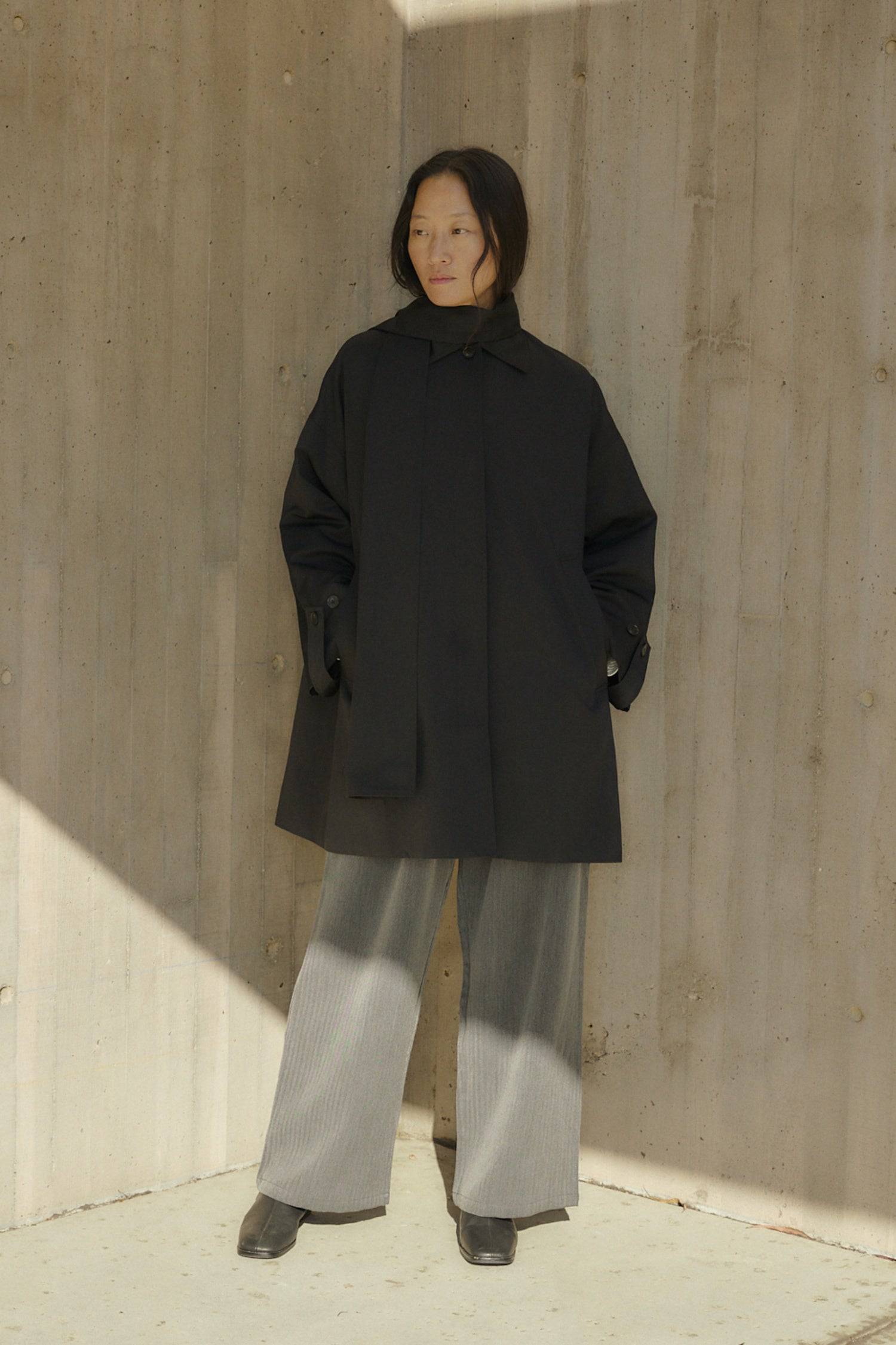 8828669198557, The Cove Coat, Outerwear, Mod Ref, attached scarf,Black,cf-color-black,cf-color-khaki,cf-size-l,cf-size-m,cf-size-s,cf-vendor-mod-ref,Coat,coat jacket,Comfort,Comfortable,Detail,Details,Fall,layer,layering,Layers,Long,Long Sleeve,modref,new,Outerwear,Oversized,Oversized Coat,Peacoat,Pockets,scarf,Spring,Summer,Transitional,Trench,Trench Coat,Womens, Information The Cove Coat offers an effortless chic style. It sits slightly below the hips for a trendy look and includes an attachable scarf for