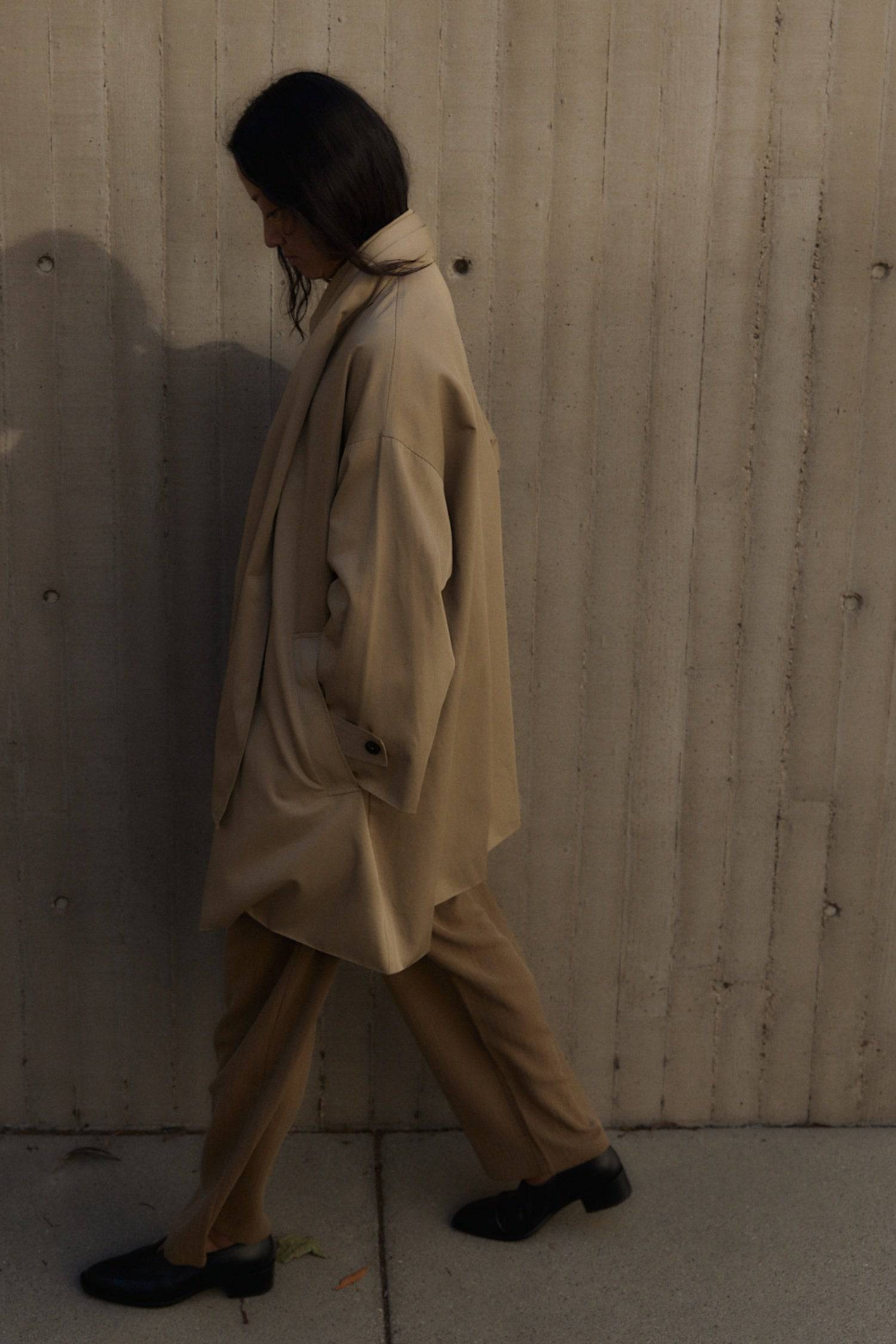 8828669198557, The Cove Coat, Outerwear, Mod Ref, attached scarf,Black,cf-color-black,cf-color-khaki,cf-size-l,cf-size-m,cf-size-s,cf-vendor-mod-ref,Coat,coat jacket,Comfort,Comfortable,Detail,Details,Fall,layer,layering,Layers,Long,Long Sleeve,modref,new,Outerwear,Oversized,Oversized Coat,Peacoat,Pockets,scarf,Spring,Summer,Transitional,Trench,Trench Coat,Womens, Information The Cove Coat offers an effortless chic style. It sits slightly below the hips for a trendy look and includes an attachable scarf for