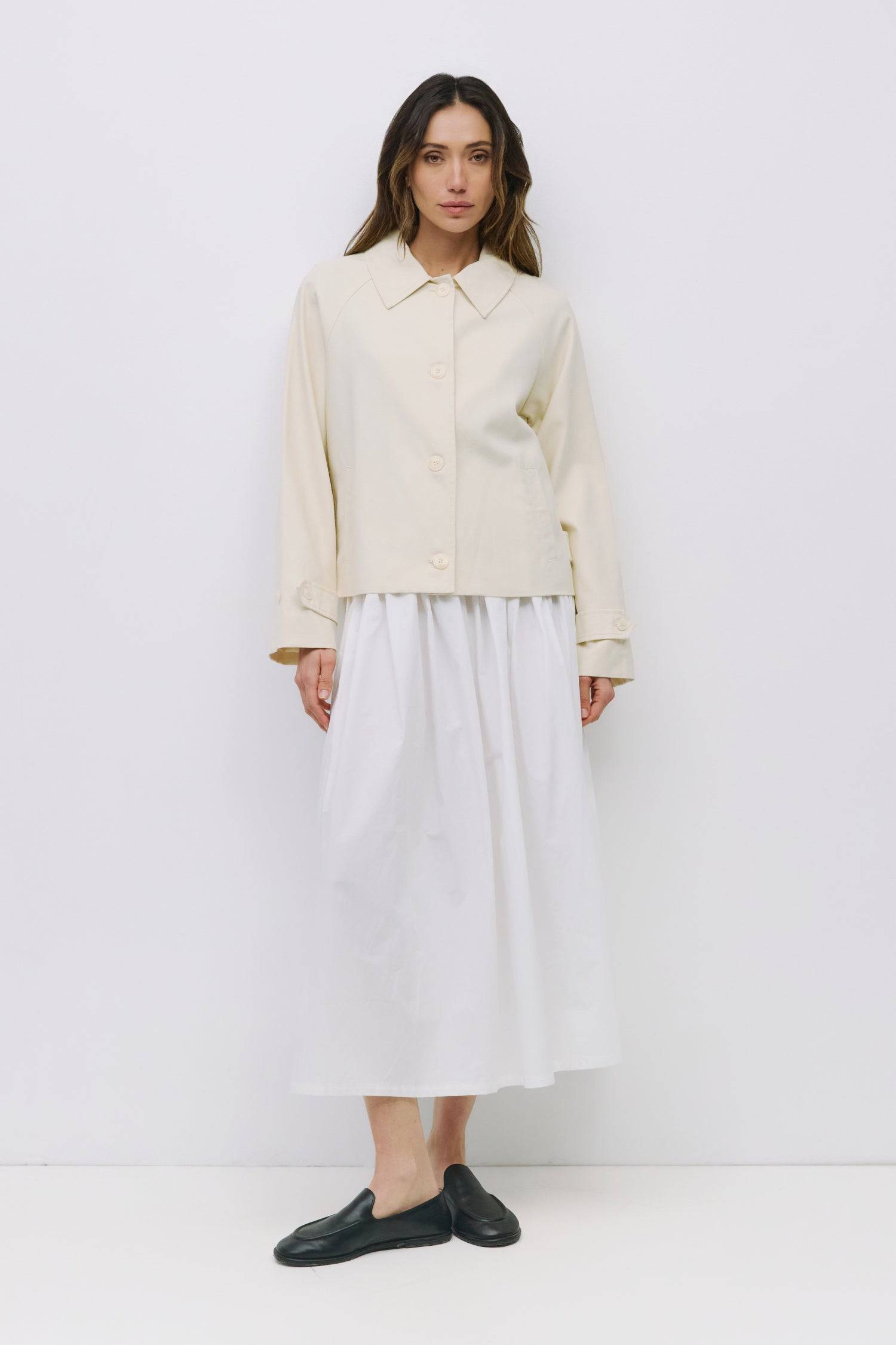 9023166251229, The Melina Jacket, Outerwear, Mod Ref, Button,Buttons,Casual,cf-color-black,cf-color-cream,cf-size-l,cf-size-m,cf-vendor-mod-ref,Collared Jacket,Comfortable,Cream,Fall,Front Pockets,Jacket,Light Jacket,Long Sleeve,modref,new,Outerwear,Pockets,Relaxed,Summer,Women's, Information The Melina Jacket is a refined take on a classic silhouette. This short trench jacket is crafted from a midweight cotton-Tencel blend for a structured yet breathable feel. Designed with raglan sleeves, adjustable butto