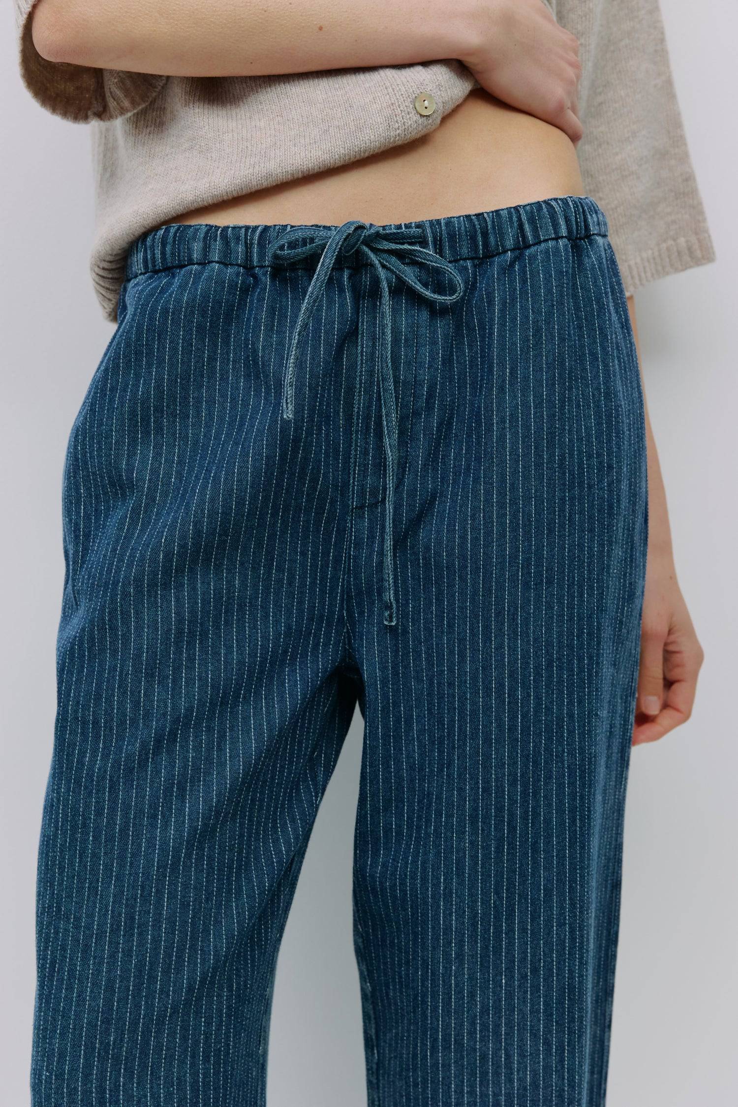 8993018478813, The Kennedy Pants, Bottoms, All Row, adjustable,adjustable ties,All Row,allrow,baggy,Basic,Blue,Bottom,Bottoms,Casual,cf-color-black,cf-color-blue,cf-color-denim,cf-size-l,cf-size-m,cf-size-s,cf-vendor-all-row,Comfort,Comfortable,Cotton,Denim,Front Tie,Long Pants,new,Pant,Pants,Relaxed,Relaxed Fit,Summer,Transitional,Vintage,Wide Leg Pants,Womens, Information The Kennedy Pants are tailored from midweight pinstripe denim with a relaxed yet refined feel. Designed with an adjustable tie waist, f