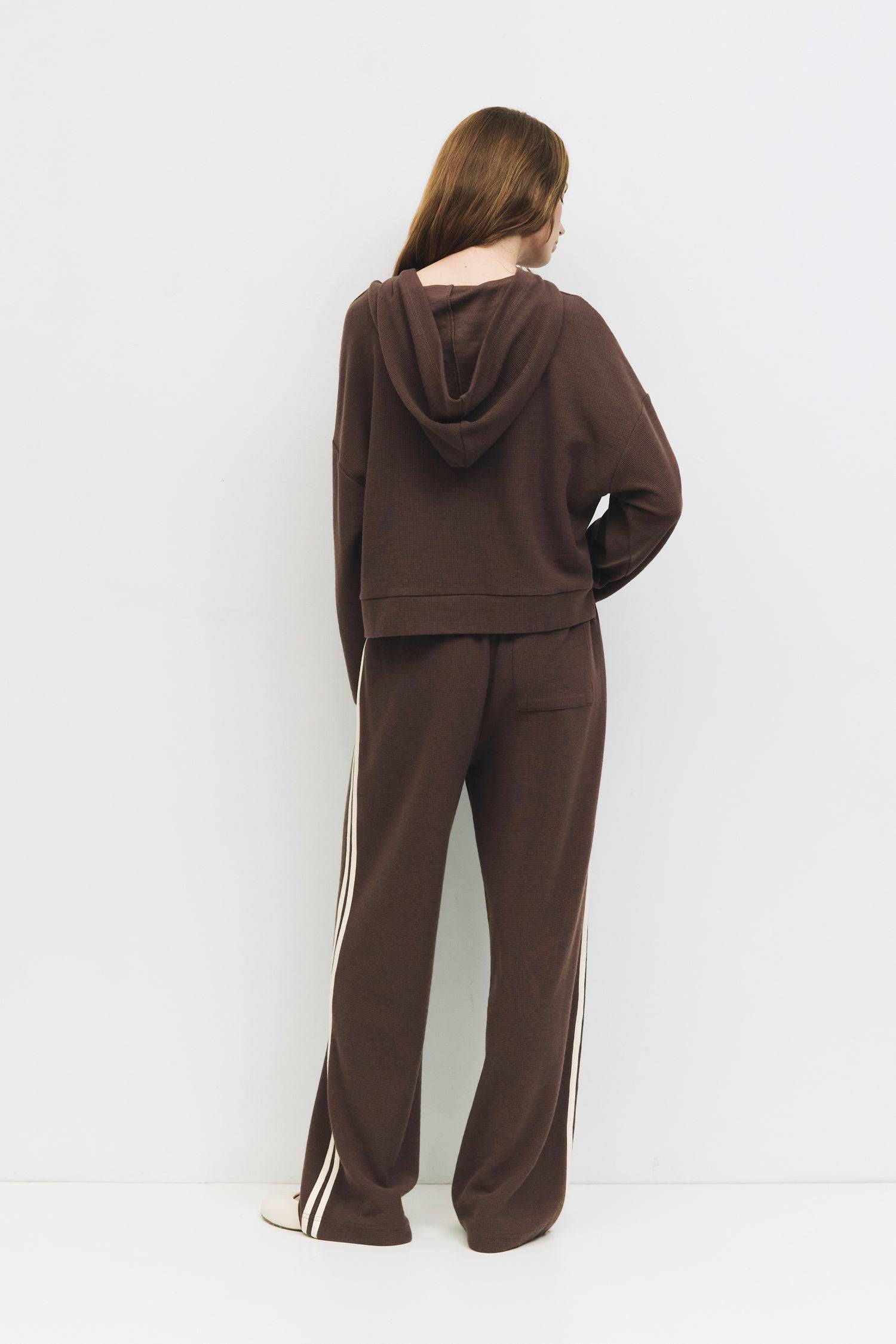 9084508078301, The Enzo Pants, Bottoms, All Row, Basic,Basics,Bottoms,brown,Casual,cf-color-brown,cf-color-navy,cf-size-l,cf-size-m,cf-size-s,cf-vendor-mod-ref,Chestnut Brown,Comfortable,dark brown,Drawstring,drawstring waist,Everyday,Long Pants,Lounge,Loungewear,mid rise,modref,Navy,Pants,Patch Pockets,Relaxed,Relaxed Fit,Sets,Spring,waffle knit,Wide Leg,Wide Leg Pants,women,Womens, Information The Enzo Pants blend sporty style with relaxed comfort, featuring a wide-leg fit and elastic drawstring waistband
