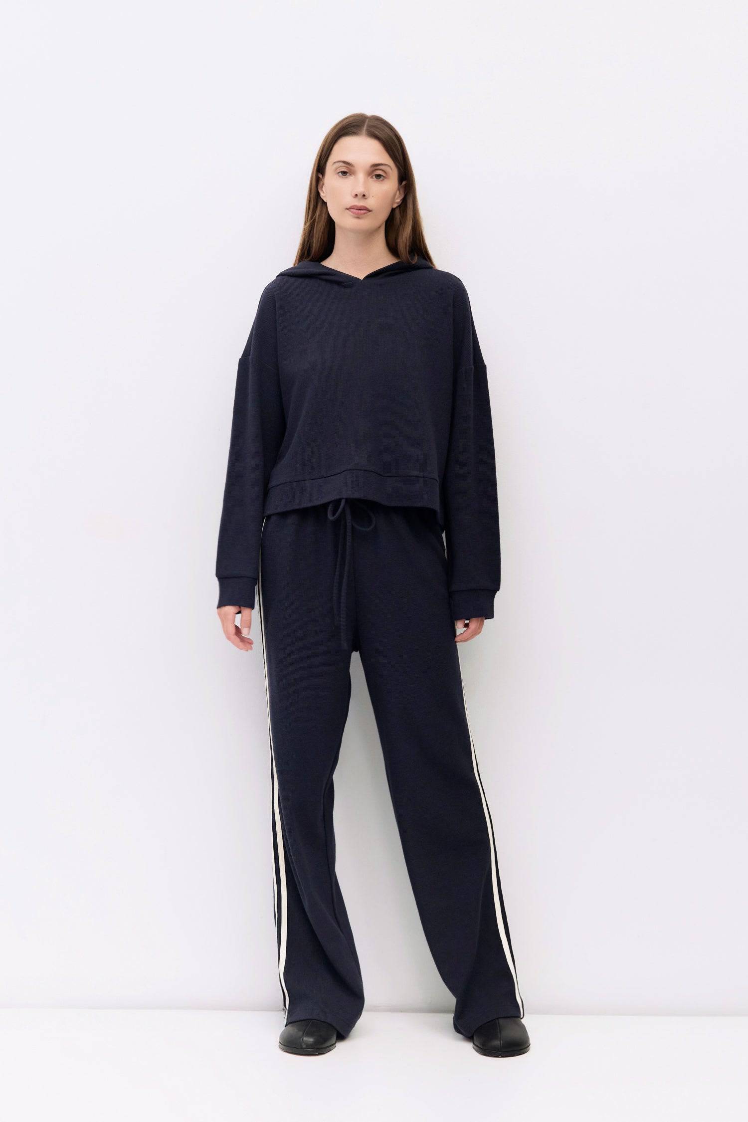9084508078301, The Enzo Pants, Bottoms, All Row, Basic,Basics,Bottoms,brown,Casual,cf-color-brown,cf-color-navy,cf-size-l,cf-size-m,cf-size-s,cf-vendor-mod-ref,Chestnut Brown,Comfortable,dark brown,Drawstring,drawstring waist,Everyday,Long Pants,Lounge,Loungewear,mid rise,modref,Navy,Pants,Patch Pockets,Relaxed,Relaxed Fit,Sets,Spring,waffle knit,Wide Leg,Wide Leg Pants,women,Womens, Information The Enzo Pants blend sporty style with relaxed comfort, featuring a wide-leg fit and elastic drawstring waistband