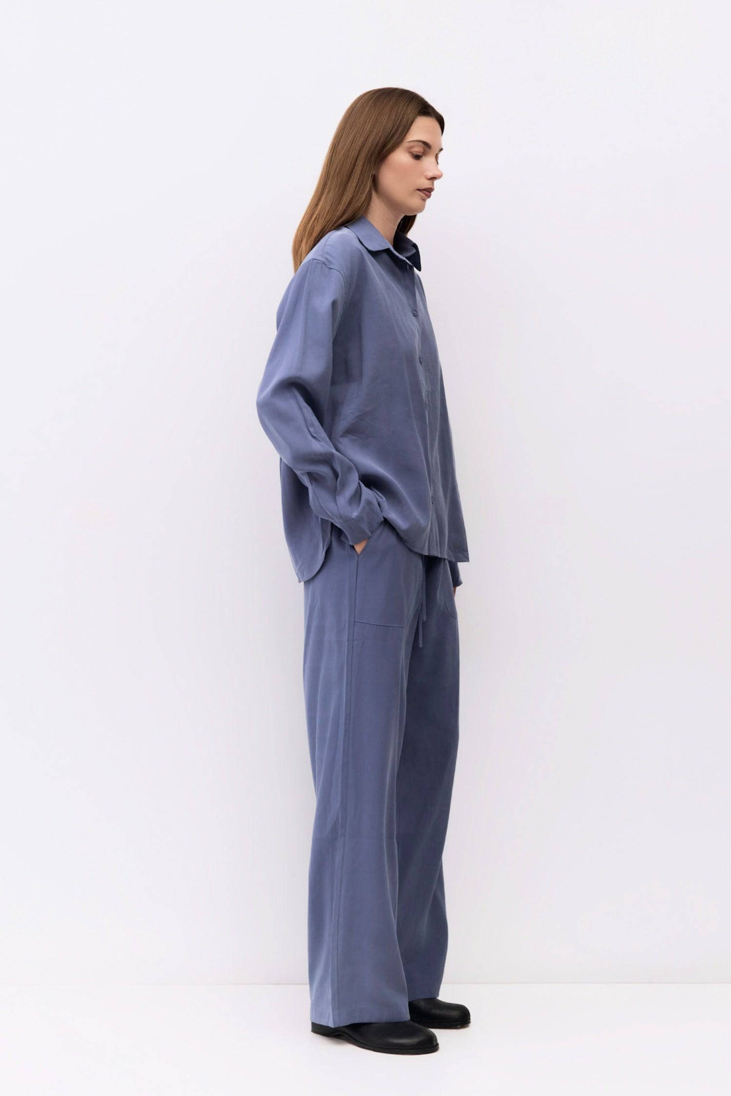 9084436185309, The Ellis Pants, Bottoms, All Row, Basic,Basics,Bottoms,Casual,cf-size-l,cf-size-m,cf-size-s,cf-vendor-mod-ref,Comfortable,Drawstring,drawstring waist,Everyday,Front Pocket,Lightweight,Long Pants,Loose,Loose Fit,mid rise,modref,Pants,Patch Pockets,Pockets,Sets,Spring,straight fit,Transitional,white,women,Womens, Information The Ellis Pants feature a loose, wide-leg fit crafted from lightweight, brushed woven fabric. The adjustable drawstring waist and front patch pockets combine comfort and s