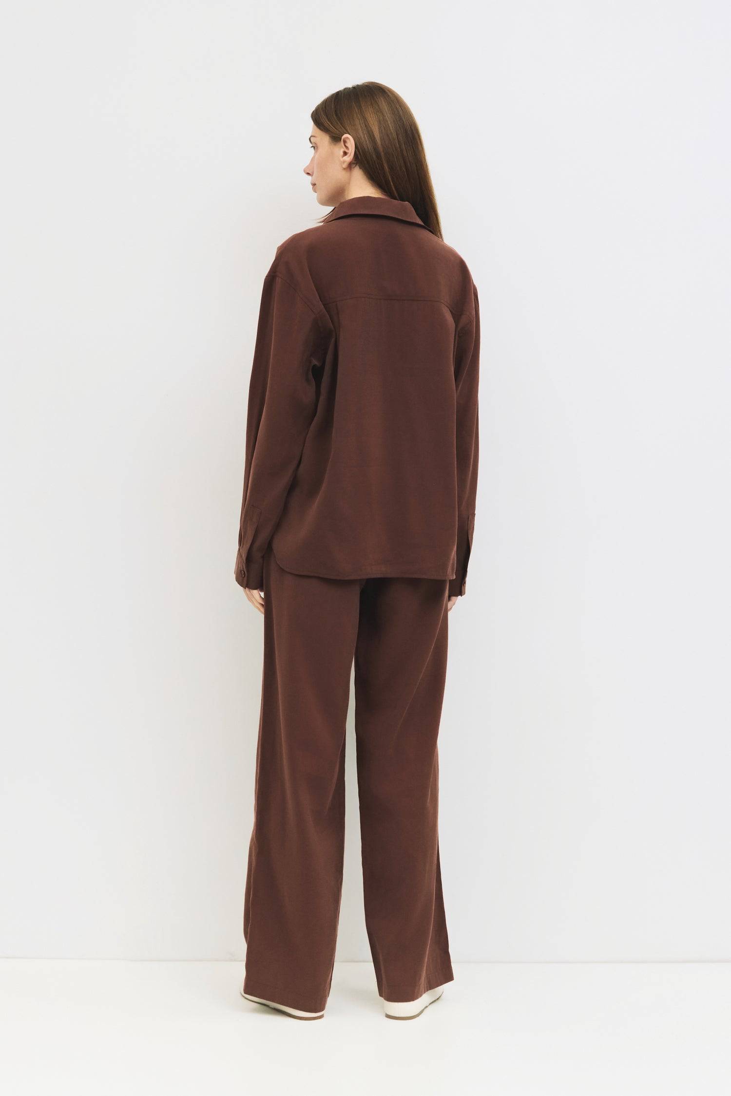 9084436185309, The Ellis Pants, Bottoms, All Row, Basic,Basics,Bottoms,Casual,cf-size-l,cf-size-m,cf-size-s,cf-vendor-mod-ref,Comfortable,Drawstring,drawstring waist,Everyday,Front Pocket,Lightweight,Long Pants,Loose,Loose Fit,mid rise,modref,Pants,Patch Pockets,Pockets,Sets,Spring,straight fit,Transitional,white,women,Womens, Information The Ellis Pants feature a loose, wide-leg fit crafted from lightweight, brushed woven fabric. The adjustable drawstring waist and front patch pockets combine comfort and s