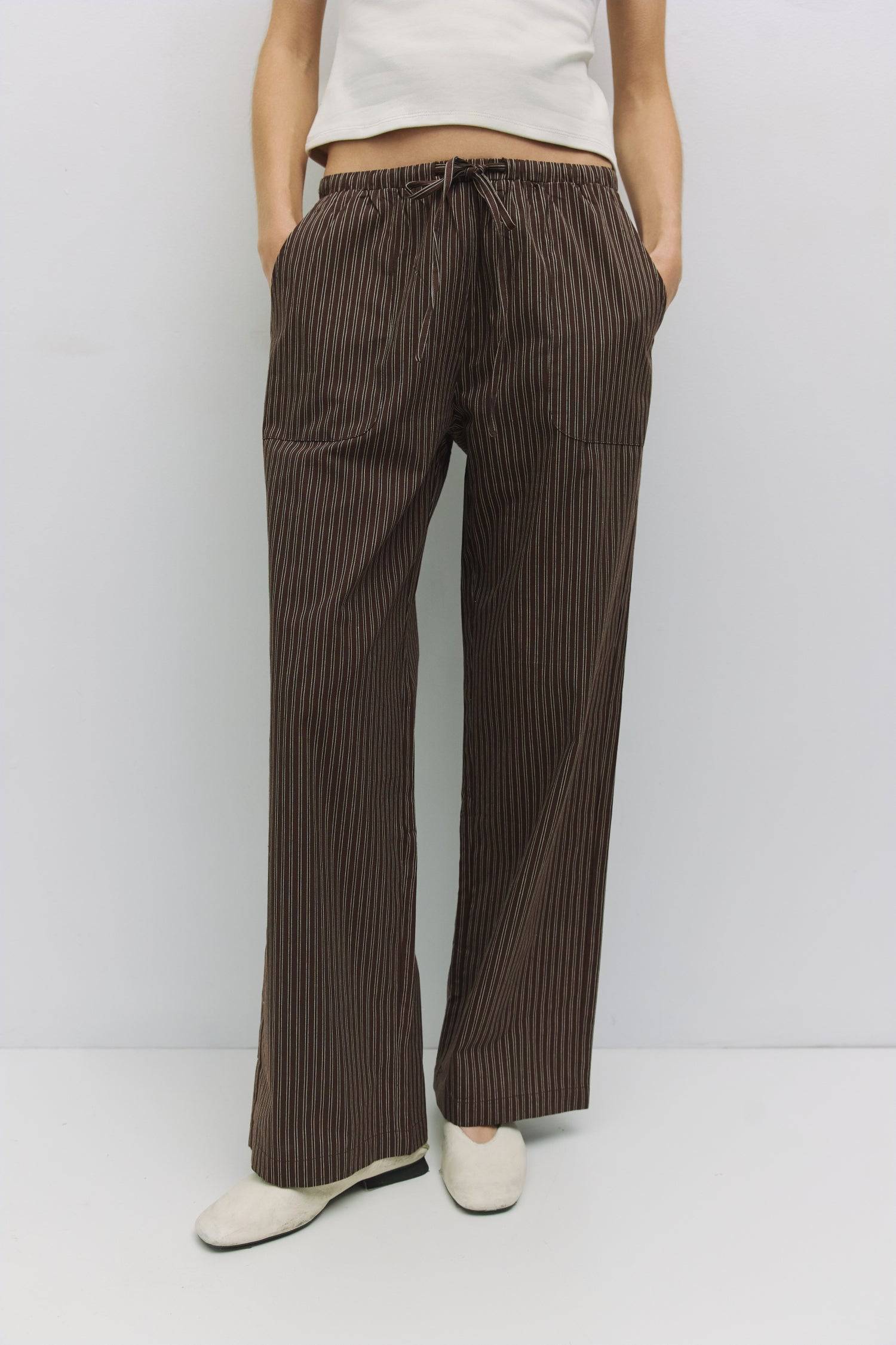 8911031107805, The Dixon Pants, Bottoms, All Row, All Row,allrow,beige,Breathable,brown,Casual,cf-color-beige,cf-color-brown,cf-size-l,cf-size-m,cf-vendor-all-row,Cotton,everyday,ivory,Khaki,Lightweight,Long Pants,Lounge,Loungewear,matching,Matching Set,new,Oversized,Pants,Pinstripes,Relaxed,Relaxed Fit,Sets,spring,Striped,Summer,Vertical Stripes,womens, Information The Dixon Pants are multi-color striped drawstring pants with a relaxed straight leg. The elasticated waist ensures a comfortable fit. Pair it