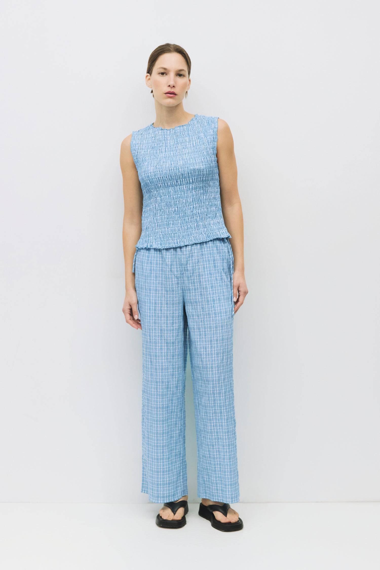 8983732879581, The Ebony Pants, Bottoms, All Row, Basic,Basics,Bottoms,Casual,cf-size-l,cf-size-m,cf-size-s,cf-vendor-mod-ref,Comfortable,Everyday,Front Pocket,Long Pants,mid rise,modref,Pants,Patch Pockets,Pleated,Pockets,Sets,Spring,straight fit,Transitional,white,women,Womens, Information The Ebony Pants are relaxed-fit, ankle-length plaid pants with an elasticized waistband and adjustable side ties for the perfect fit. Their wide-leg silhouette makes them an easy, comfortable choice for everyday wear an