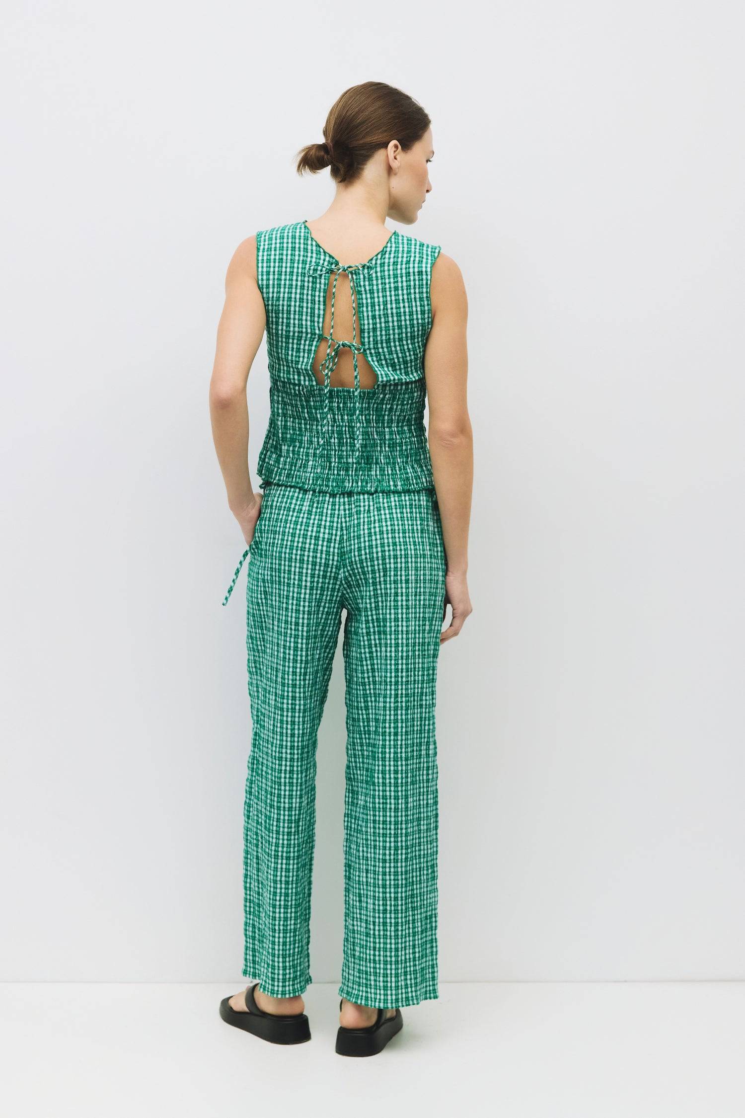 8983732879581, The Ebony Pants, Bottoms, All Row, Basic,Basics,Bottoms,Casual,cf-size-l,cf-size-m,cf-size-s,cf-vendor-mod-ref,Comfortable,Everyday,Front Pocket,Long Pants,mid rise,modref,Pants,Patch Pockets,Pleated,Pockets,Sets,Spring,straight fit,Transitional,white,women,Womens, Information The Ebony Pants are relaxed-fit, ankle-length plaid pants with an elasticized waistband and adjustable side ties for the perfect fit. Their wide-leg silhouette makes them an easy, comfortable choice for everyday wear an