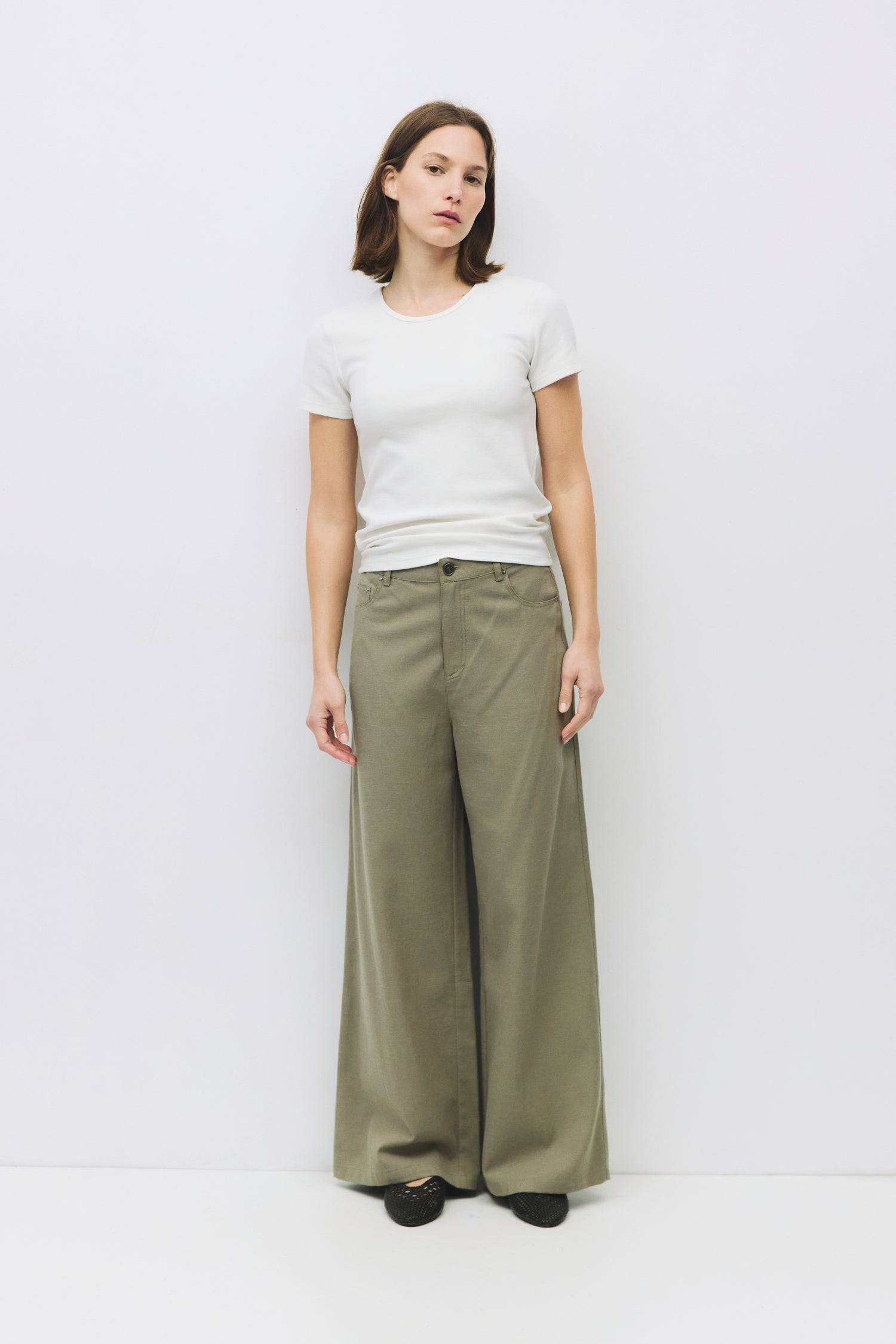 8982666281181, The Brooke Pants, Bottoms, Mod Ref, Basic,Basics,Bottoms,Casual,cf-size-l,cf-size-m,cf-size-s,cf-vendor-mod-ref,Comfortable,Everyday,Front Pocket,Long Pants,mid rise,modref,Pants,Patch Pockets,Pleated,Pockets,Sets,Spring,straight fit,Transitional,white,women,Womens, Information The Brooke Pants feature a wide-leg silhouette with a front button and hidden zipper closure for a clean, flattering fit. With side pockets, back patch pockets, and rivet details, these pants add a touch of style to an