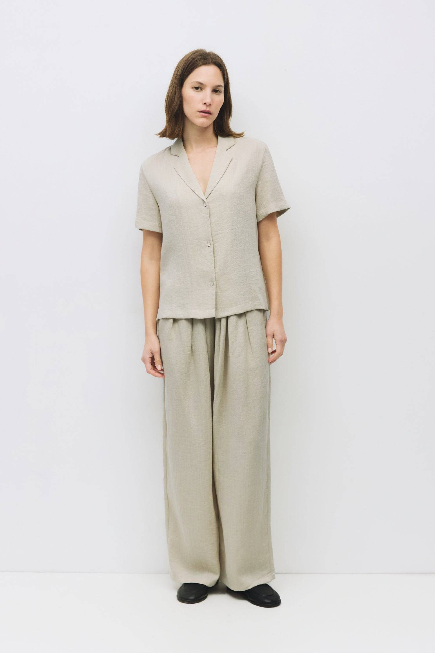 8983679598813, The Donnie Pants, Bottoms, Mod Ref, Basic,Basics,Bottoms,Casual,cf-size-l,cf-size-m,cf-size-s,cf-vendor-mod-ref,Comfortable,Everyday,Front Pocket,Long Pants,mid rise,modref,Pants,Patch Pockets,Pleated,Pockets,Sets,Spring,straight fit,Transitional,white,women,Womens, Information The Donnie Pants are pull-on trousers that feature a relaxed fit, an elasticized waistband, and front pleating. Complete with side pockets for everyday ease. Details Self: 53% Recycled Polyester, 27% Nylon,14% Tencel,