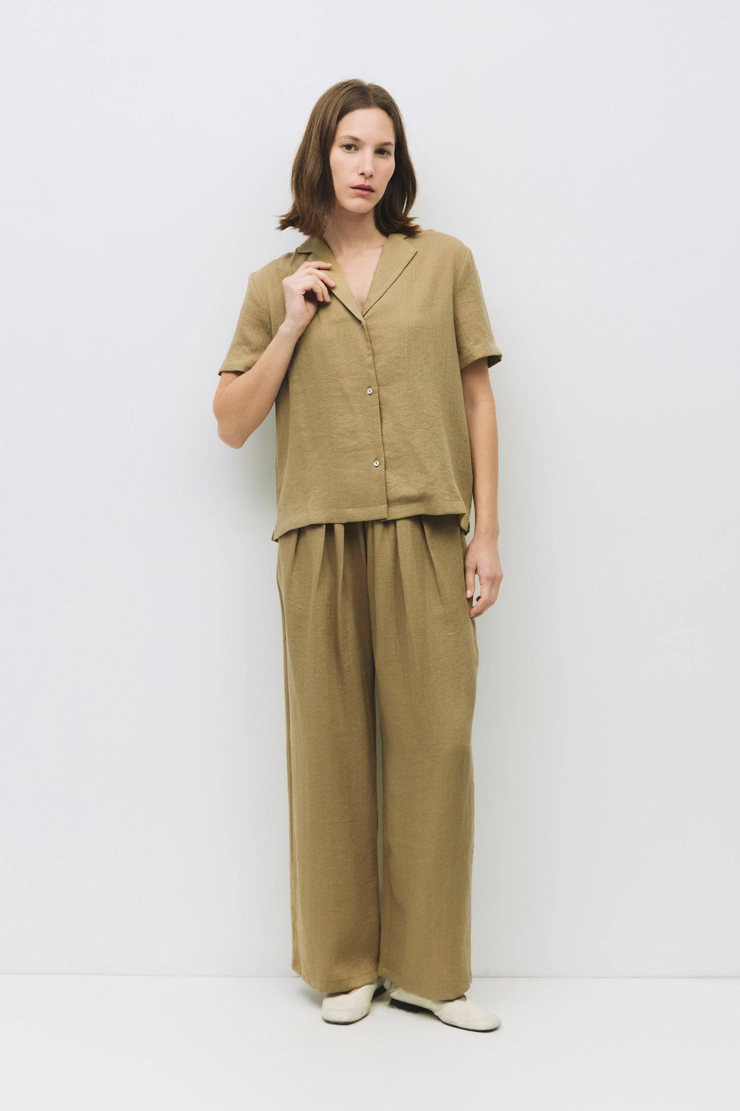 8983679598813, The Donnie Pants, Bottoms, Mod Ref, Basic,Basics,Bottoms,Casual,cf-size-l,cf-size-m,cf-size-s,cf-vendor-mod-ref,Comfortable,Everyday,Front Pocket,Long Pants,mid rise,modref,Pants,Patch Pockets,Pleated,Pockets,Sets,Spring,straight fit,Transitional,white,women,Womens, Information The Donnie Pants are pull-on trousers that feature a relaxed fit, an elasticized waistband, and front pleating. Complete with side pockets for everyday ease. Details Self: 53% Recycled Polyester, 27% Nylon,14% Tencel,