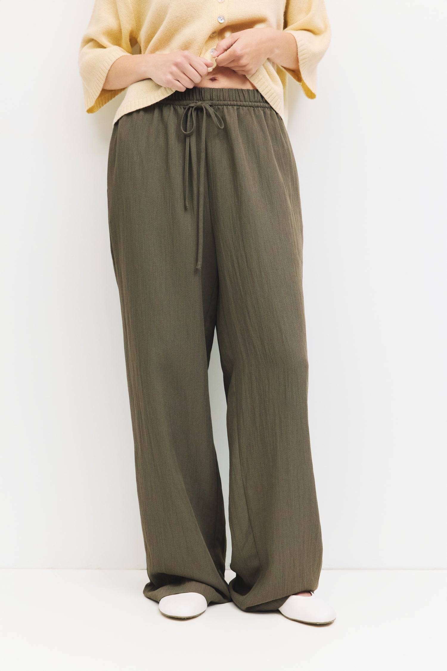 9045669282013, The Matilda Pants, Bottoms, Mod Ref, beige,Breathable,brown,Casual,cf-color-beige,cf-color-bone,cf-color-brown,cf-color-olive,cf-size-l,cf-size-m,cf-size-s,cf-vendor-mod-ref,Cotton,Elastic,Elastic Waistband,everyday,Front Tie,front ties,ivory,Lightweight,Long Pants,new,nylon,Pants,Pocket,Pockets,Relaxed,Relaxed Fit,Semi-Casual,side pockets,Tie,wide,Wide Leg,Wide Leg Pants,womens, Information The Matilda Pants are wide-leg pull-on pants designed with an adjustable elastic waistband and feature