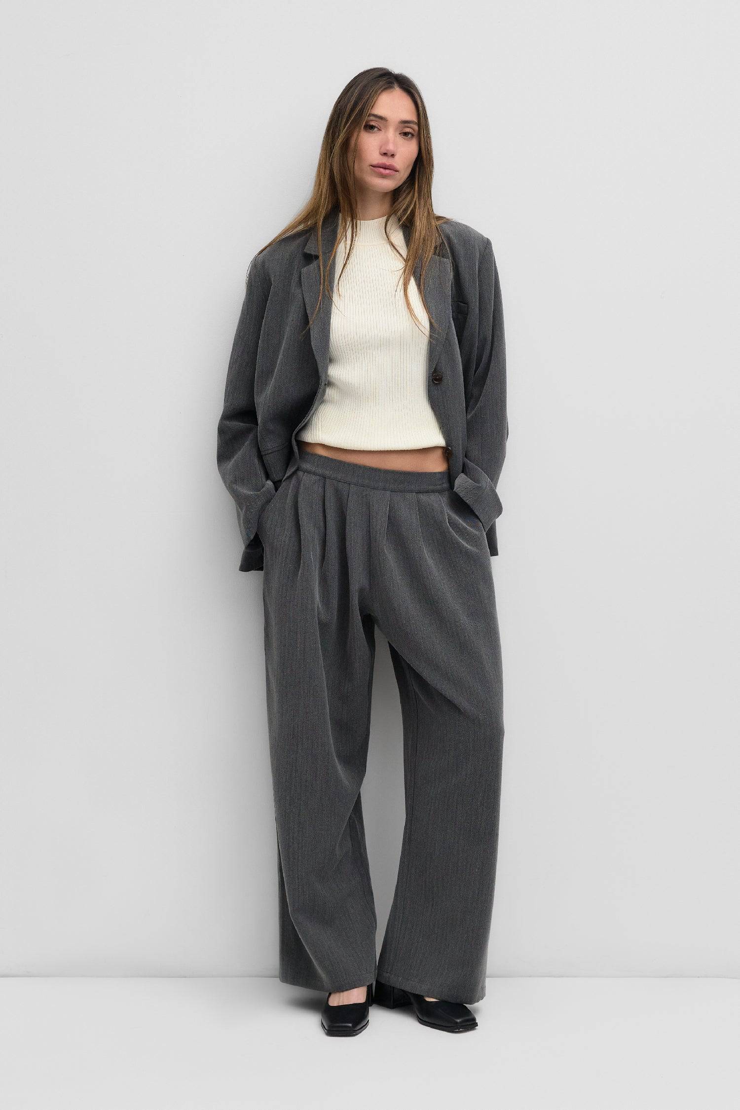 8722358665437, The Kerry Pants, Bottoms, Mod Ref, Basic,Basics,Belt Loops,Bottoms,brown,Business Casual,cf-color-brown,cf-color-grey,cf-color-natural,cf-size-l,cf-size-m,cf-size-s,cf-vendor-mod-ref,Grey,herringbone,Long Pants,Matching Set,mid rise,modref,natural,Pants,Pleated,Sets,Spring,straight fit,Transitional,women,Womens, Information The Kerry Pants are your classic full-length herringbone trousers designed with a front pleat and an elasticated back waist for added comfort. Style it with The Kerry Blaz