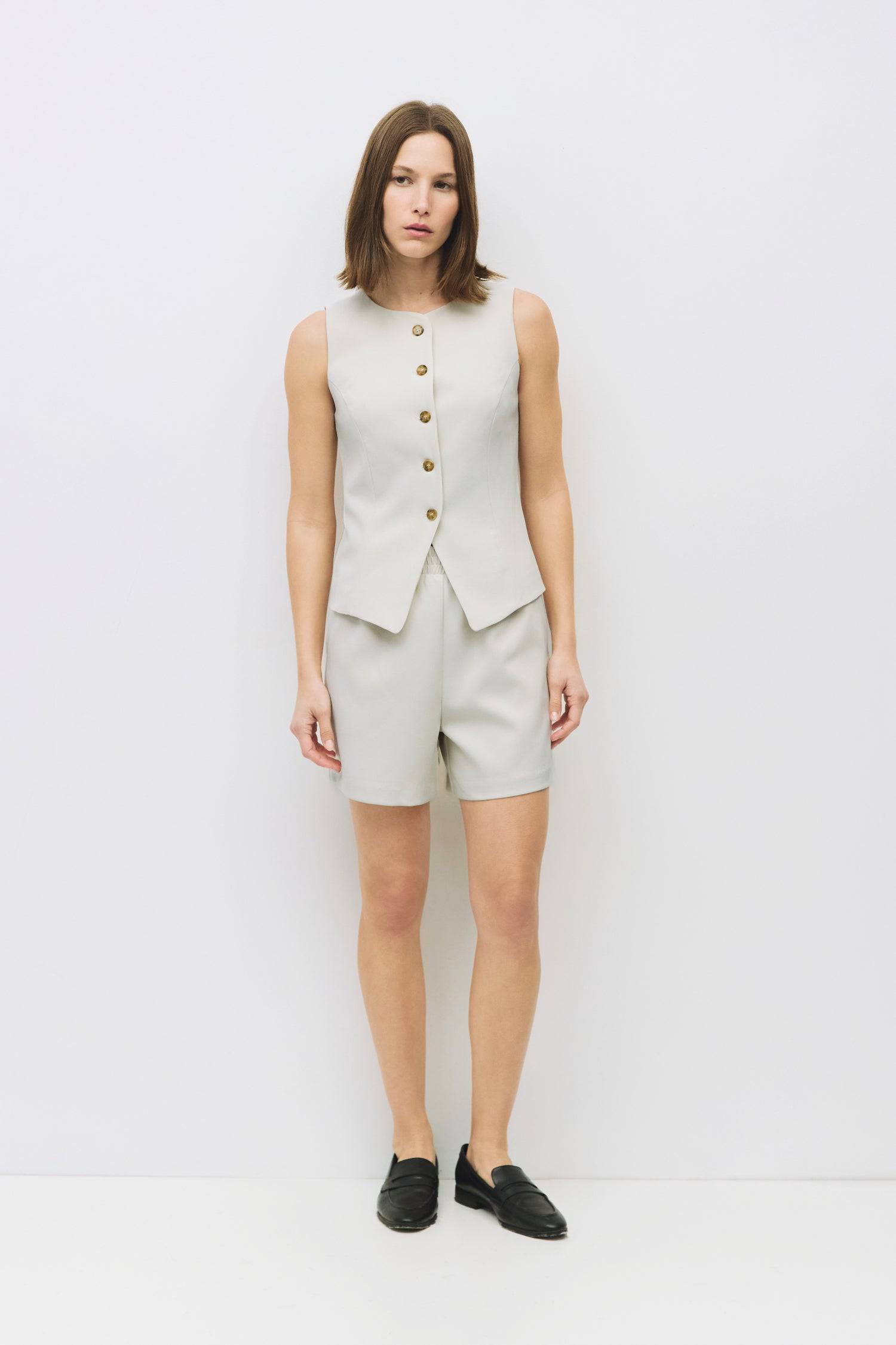 8954056409309, The Justine Shorts, Bottoms, Mod Ref, allrow,Black,Bone,Business Casual,Casual,cf-color-black,cf-color-bone,cf-size-l,cf-size-m,cf-size-s,cf-size-xl,cf-size-xs,cf-vendor-all-row,Comfort,Comfortable,cotton,High Waist,Matching Set,new,Pleats,Pockets,Relaxed,set,Sets,Shorts,Spring,texture,Women's, Information The Justine Shorts offers the look of tailored shorts with an elastic waistband for comfort. Featuring welt pockets and a lined finish, it pairs perfectly with The Justine Top (TR3870) for