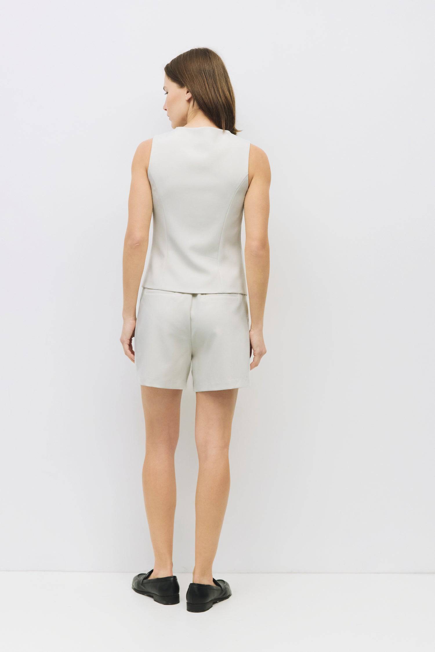 8954056409309, The Justine Shorts, Bottoms, Mod Ref, allrow,Black,Bone,Business Casual,Casual,cf-color-black,cf-color-bone,cf-size-l,cf-size-m,cf-size-s,cf-size-xl,cf-size-xs,cf-vendor-all-row,Comfort,Comfortable,cotton,High Waist,Matching Set,new,Pleats,Pockets,Relaxed,set,Sets,Shorts,Spring,texture,Women's, Information The Justine Shorts offers the look of tailored shorts with an elastic waistband for comfort. Featuring welt pockets and a lined finish, it pairs perfectly with The Justine Top (TR3870) for