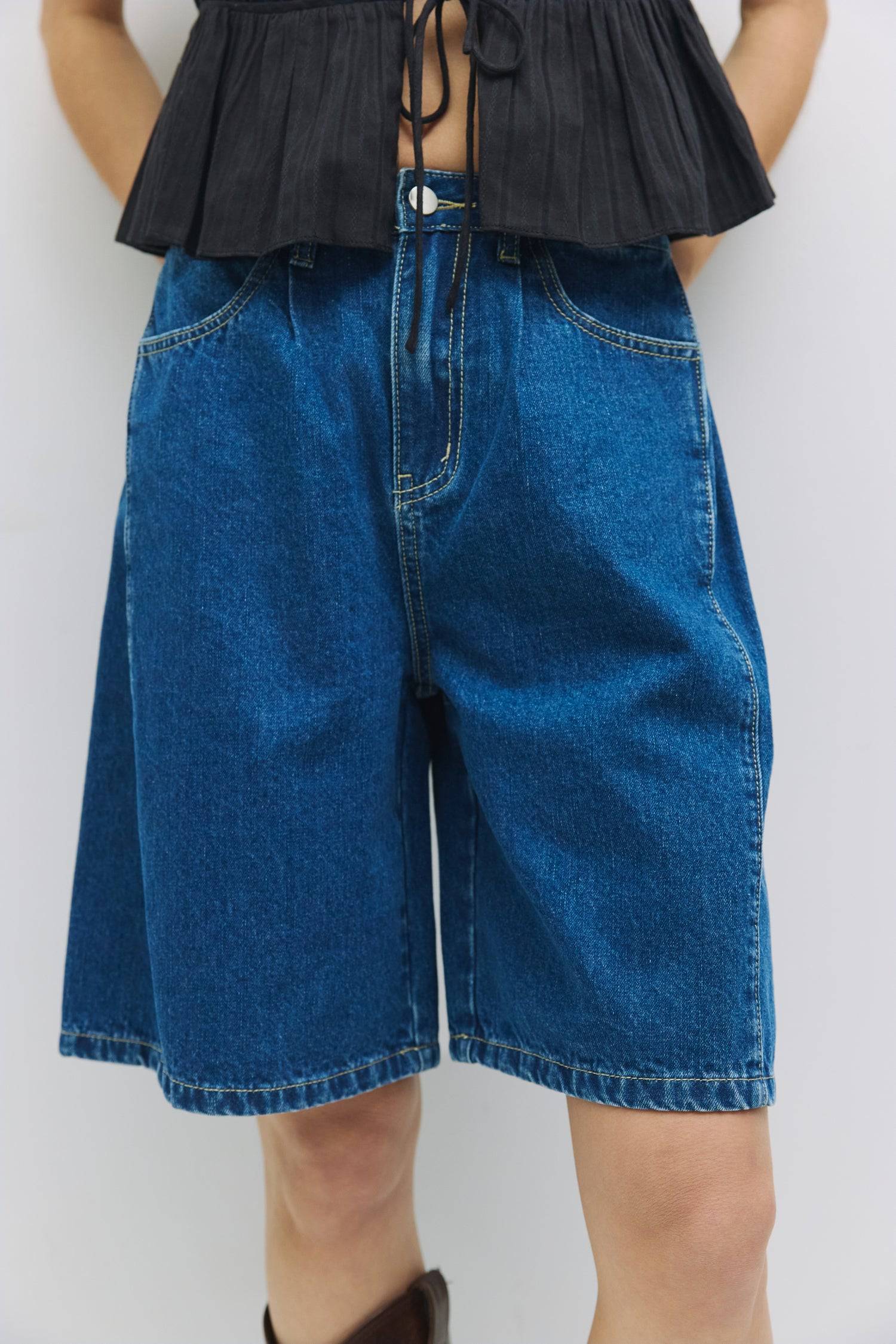 8954055295197, The Juno Shorts, Bottoms, Mod Ref, allrow,Black,Blue,Casual,cf-color-blue,cf-size-l,cf-size-m,cf-size-s,cf-size-xl,cf-size-xs,cf-vendor-all-row,Comfort,Comfortable,cotton,Cream,Everyday,Matching Set,new,Pleated,Pleats,Pockets,Relaxed,Relaxed Fit,set,Sets,Shorts,Spring,straight-leg,texture,Wide Leg,Women's, Information The Juno Shorts are wide-leg Bermuda denim shorts crafted from 100% cotton, giving you a comfortable, laid-back fit with plenty of room to move. The pleated side details, front