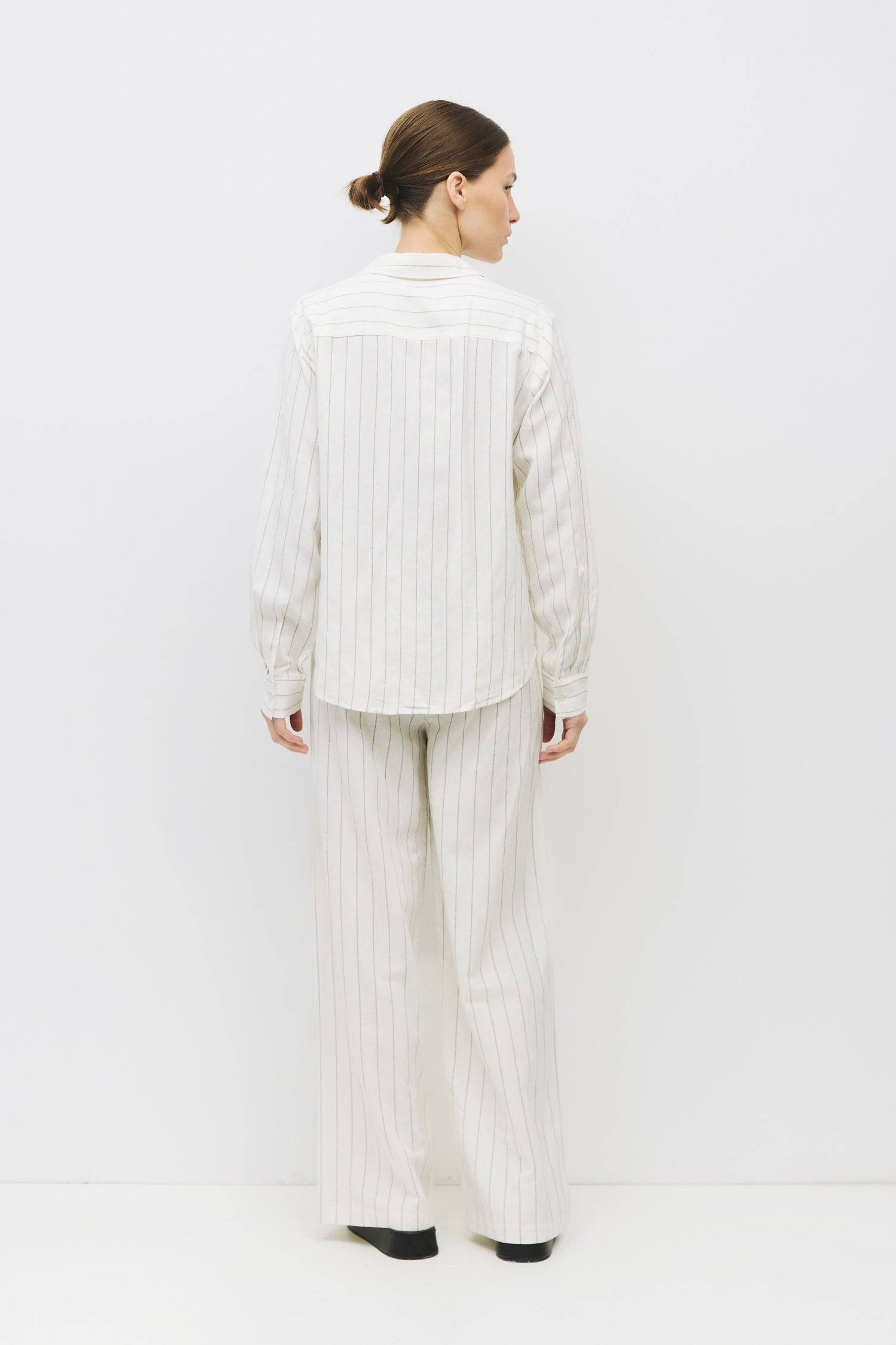 8983687069917, The Raquel Pants, Bottoms, Mod Ref, Basic,Basics,Bottoms,Casual,cf-size-l,cf-size-m,cf-size-s,cf-vendor-mod-ref,Comfortable,Everyday,Front Pocket,Long Pants,mid rise,modref,Pants,Patch Pockets,Pleated,Pockets,Sets,Spring,straight fit,Transitional,white,women,Womens, Information The Raquel Pants are a stylish pinstripe design made from a comfortable linen blend, featuring a front button and zipper closure with an elasticized back waistband for a secure fit. With a separate self-tie belt, side