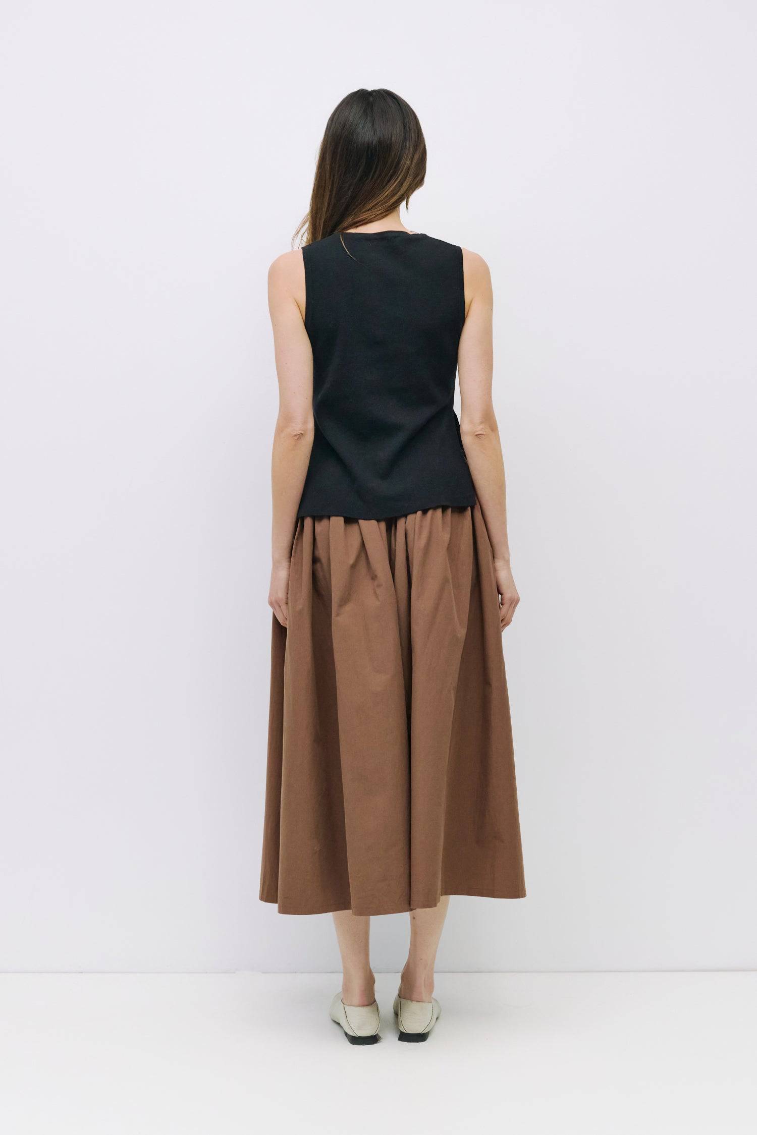 8994991636701, The Kiana Skirt, Bottoms, All Row, Black,Bottom,Bottoms,Breathable,cf-color-black,cf-color-white,cf-color-yellow,cf-size-l,cf-size-m,cf-size-s,cf-vendor-all-row,Comfortable,everyday,High Waist,Midi Skirt,new,Skirt,spring,Summer,versatile,white,womens, Information The Kiana Skirt features adjustable ties on either side of the waist for a customizable fit. Crafted from midweight fabric, it offers a flattering silhouette with a relaxed, effortless vibe. Details 100% Cotton Adjustable Side Waist