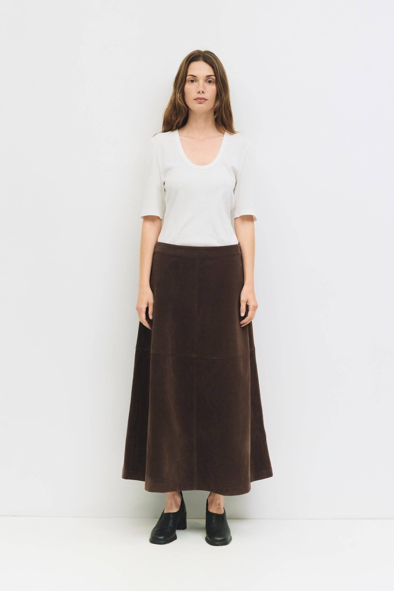 9084503818461, The Eryn Skirt, Bottoms, All Row, Bottom,Bottoms,brown,cf-color-brown,cf-color-khaki,cf-size-l,cf-size-m,cf-size-s,cf-vendor-all-row,Chestnut Brown,Comfortable,dark brown,everyday,Fall,Khaki,Matching Set,mid rise,mid waist,mid weight,Midi Skirt,new,Semi-Formal,set,Sets,Skirt,spring,Structured,suede,Textured Fabric,versatile,womens, Information The Eryn Skirt is a sleek A-line midi crafted from midweight suede, designed with a side invisible zipper and hidden hook-and-eye closure for a clean f