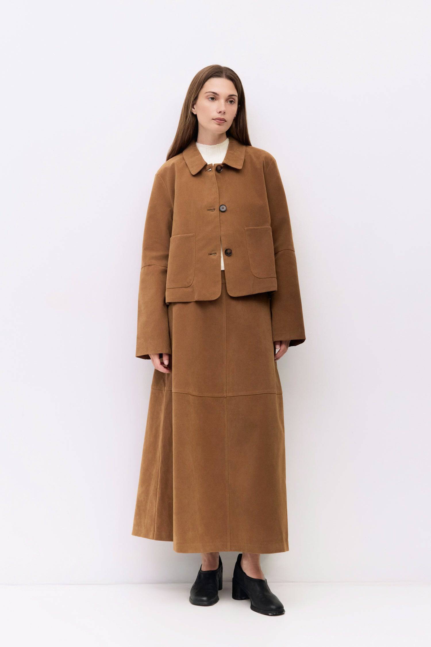 9084503818461, The Eryn Skirt, Bottoms, All Row, Bottom,Bottoms,brown,cf-color-brown,cf-color-khaki,cf-size-l,cf-size-m,cf-size-s,cf-vendor-all-row,Chestnut Brown,Comfortable,dark brown,everyday,Fall,Khaki,Matching Set,mid rise,mid waist,mid weight,Midi Skirt,new,Semi-Formal,set,Sets,Skirt,spring,Structured,suede,Textured Fabric,versatile,womens, Information The Eryn Skirt is a sleek A-line midi crafted from midweight suede, designed with a side invisible zipper and hidden hook-and-eye closure for a clean f