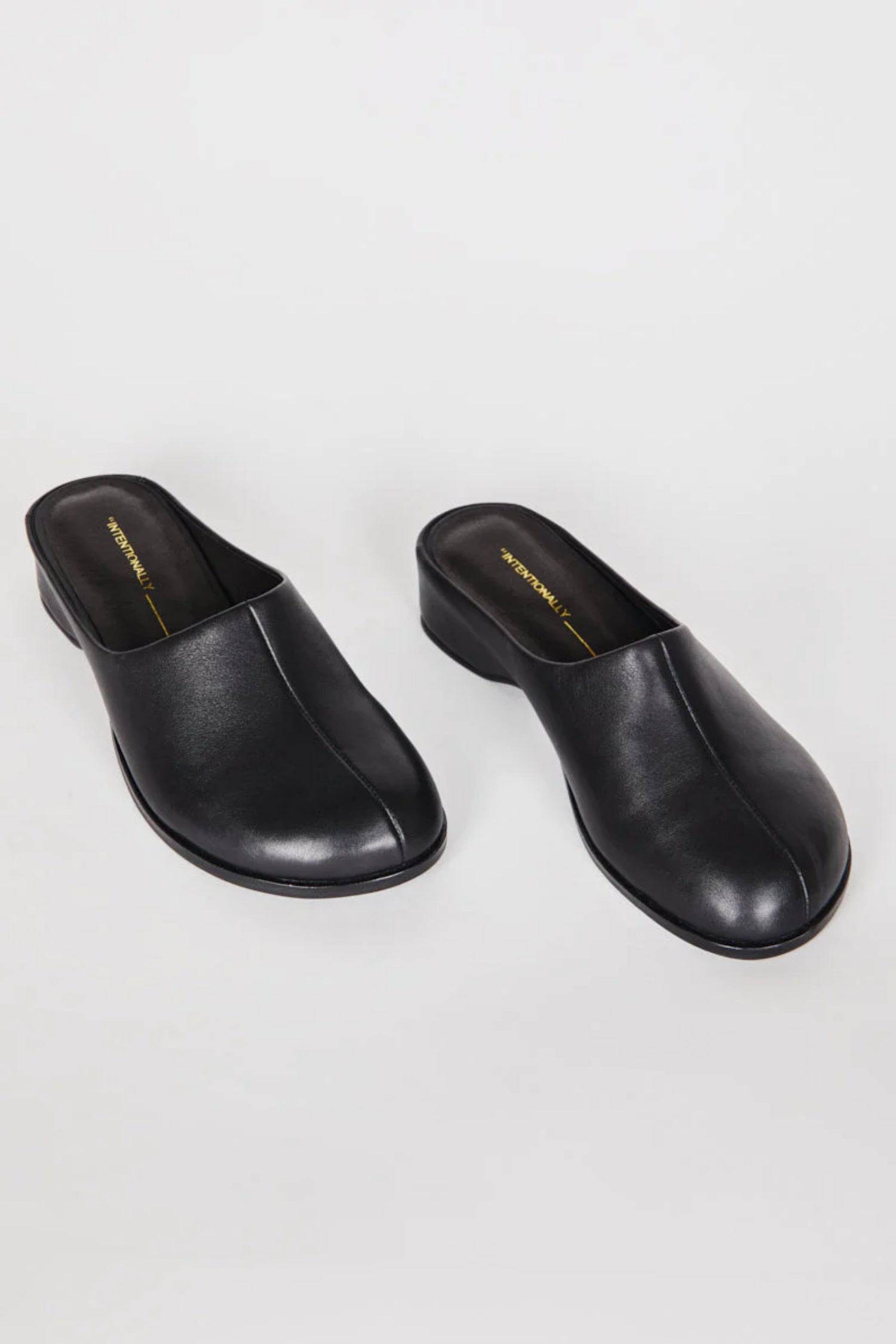 8341268594909, Shift Leather Bubble Clog, Shoes, Intentionally Blank, All Row,Basic,Basics,Black,cf-size-6,cf-size-7,cf-size-8,cf-size-9,cf-vendor-intentionally-blank,Everyday,final-sale,finalsale,leather shoe,Mod Ref,round toe,sale,shoes,Transitional,Women's,women's shoes, Information We like it low. This smashed bubble clog is fun, chic and unexpected. Slip it on and go! We love the toe shape and vibe this creates with dresses, shorts, and pants. Details Leather upper Leather lining Memory foam footbed He