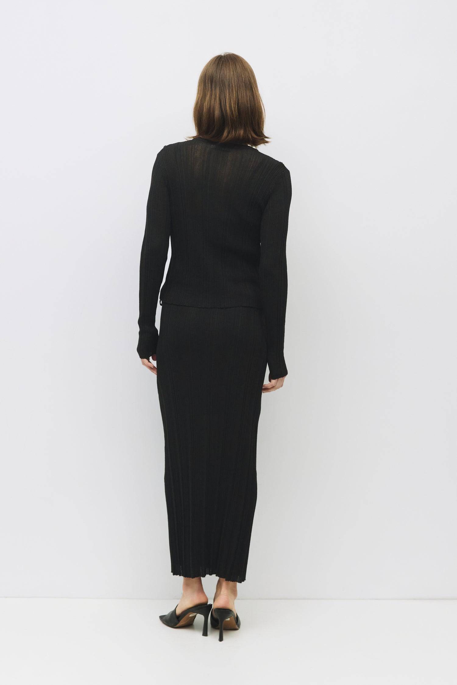 8954054770909, The Trinity Skirt, Dress, Mod Ref, Black,Bottom,Bottoms,Casual,cf-color-black,cf-color-cream,cf-size-l,cf-size-m,cf-size-s,cf-vendor-mod-ref,Comfortable,Cotton,Cream,curve skirt,drawstring waist,Dress,Everyday,Form Fitting,Linen,linen-blend,maxi skirt,Midi Dress,midi length,new,Rib Knit,Ribbed,Sleeveless,Spring,Summer,womens, Information The Trinity Skirt combines sheer ribbed knitting with a satin lining for a sleek, comfortable fit that moves with you. With a hidden side zipper and hook-and