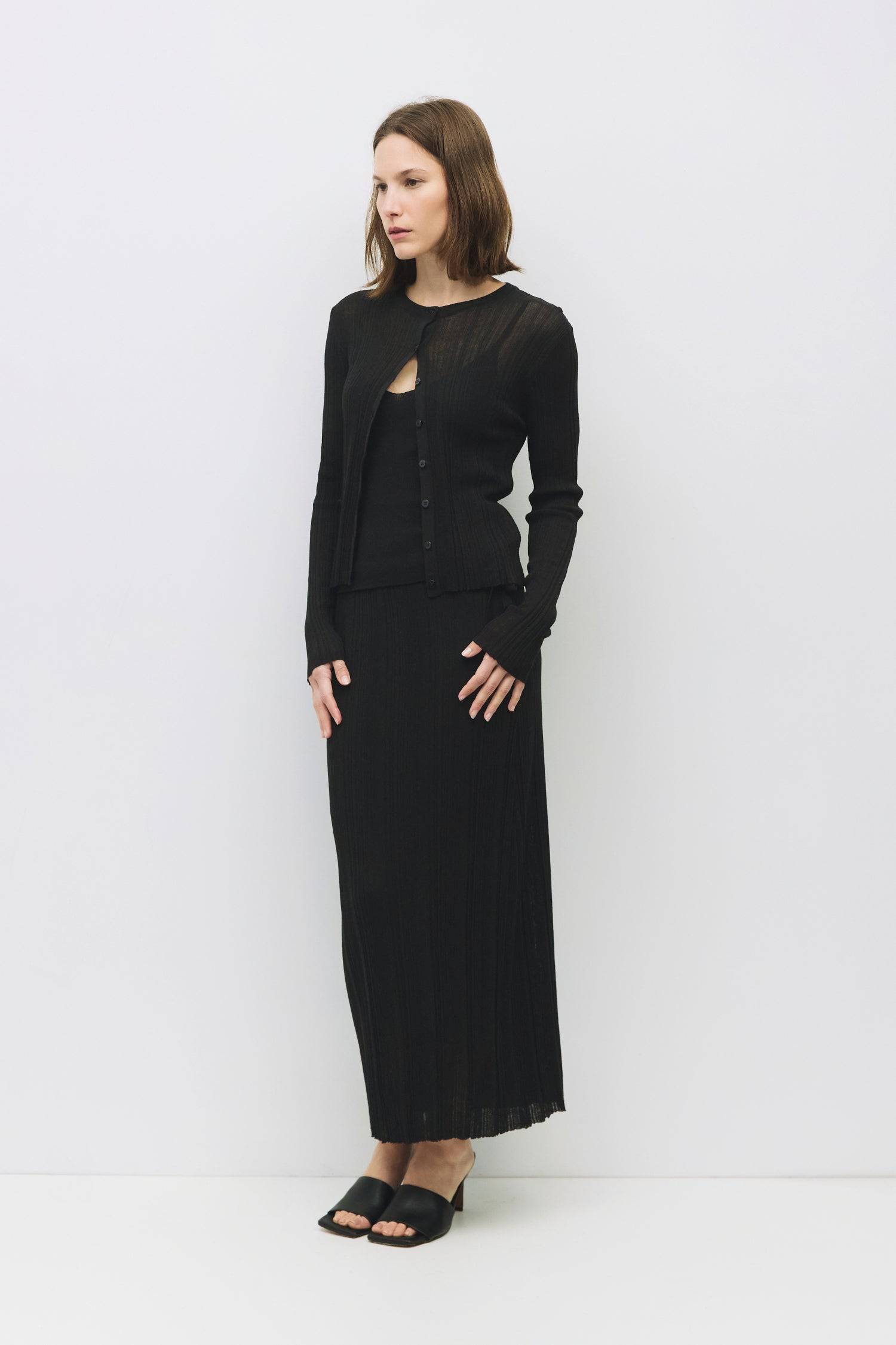 8954054770909, The Trinity Skirt, Dress, Mod Ref, Black,Bottom,Bottoms,Casual,cf-color-black,cf-color-cream,cf-size-l,cf-size-m,cf-size-s,cf-vendor-mod-ref,Comfortable,Cotton,Cream,curve skirt,drawstring waist,Dress,Everyday,Form Fitting,Linen,linen-blend,maxi skirt,Midi Dress,midi length,new,Rib Knit,Ribbed,Sleeveless,Spring,Summer,womens, Information The Trinity Skirt combines sheer ribbed knitting with a satin lining for a sleek, comfortable fit that moves with you. With a hidden side zipper and hook-and