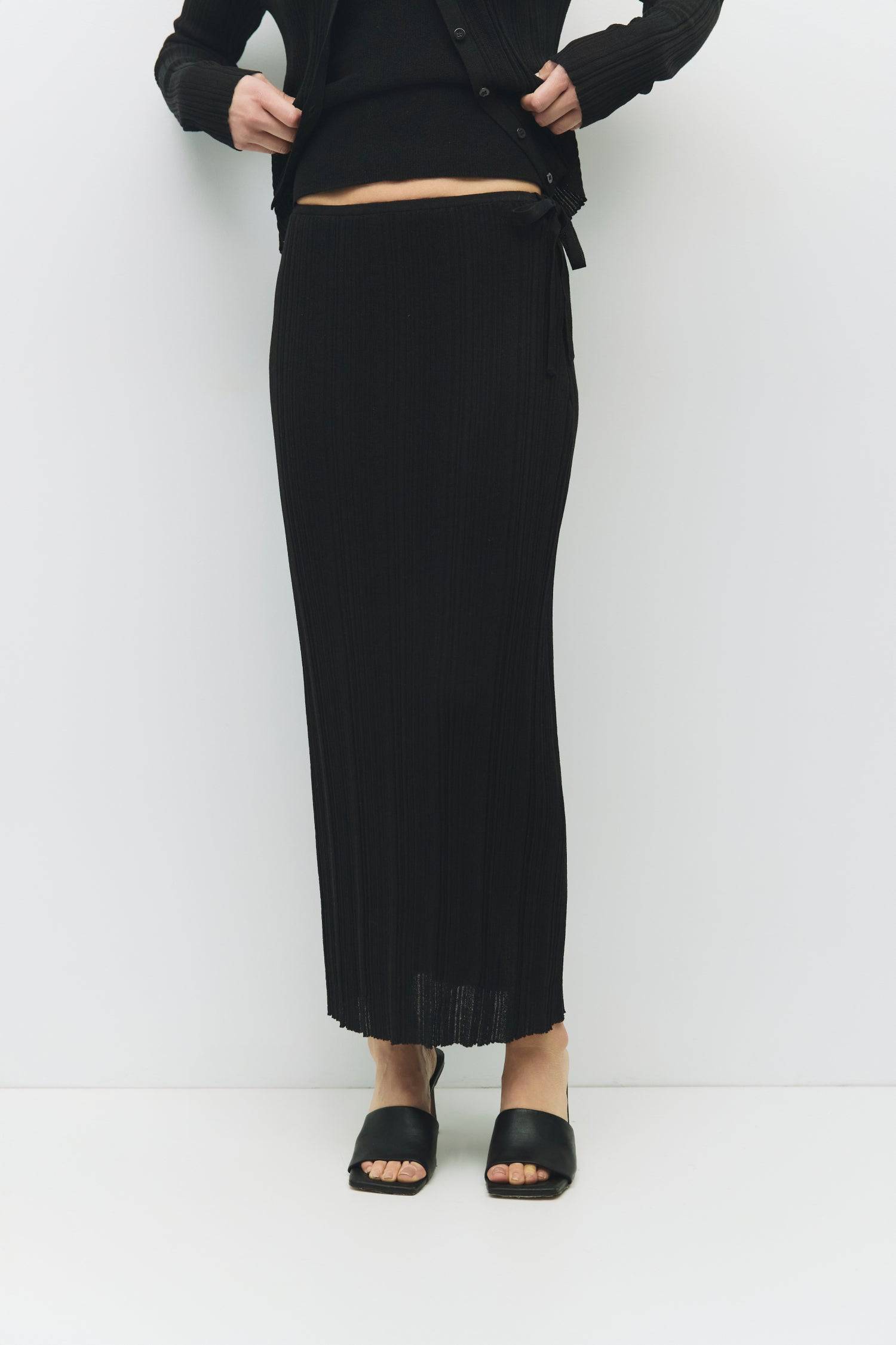 8954054770909, The Trinity Skirt, Dress, Mod Ref, Black,Bottom,Bottoms,Casual,cf-color-black,cf-color-cream,cf-size-l,cf-size-m,cf-size-s,cf-vendor-mod-ref,Comfortable,Cotton,Cream,curve skirt,drawstring waist,Dress,Everyday,Form Fitting,Linen,linen-blend,maxi skirt,Midi Dress,midi length,new,Rib Knit,Ribbed,Sleeveless,Spring,Summer,womens, Information The Trinity Skirt combines sheer ribbed knitting with a satin lining for a sleek, comfortable fit that moves with you. With a hidden side zipper and hook-and