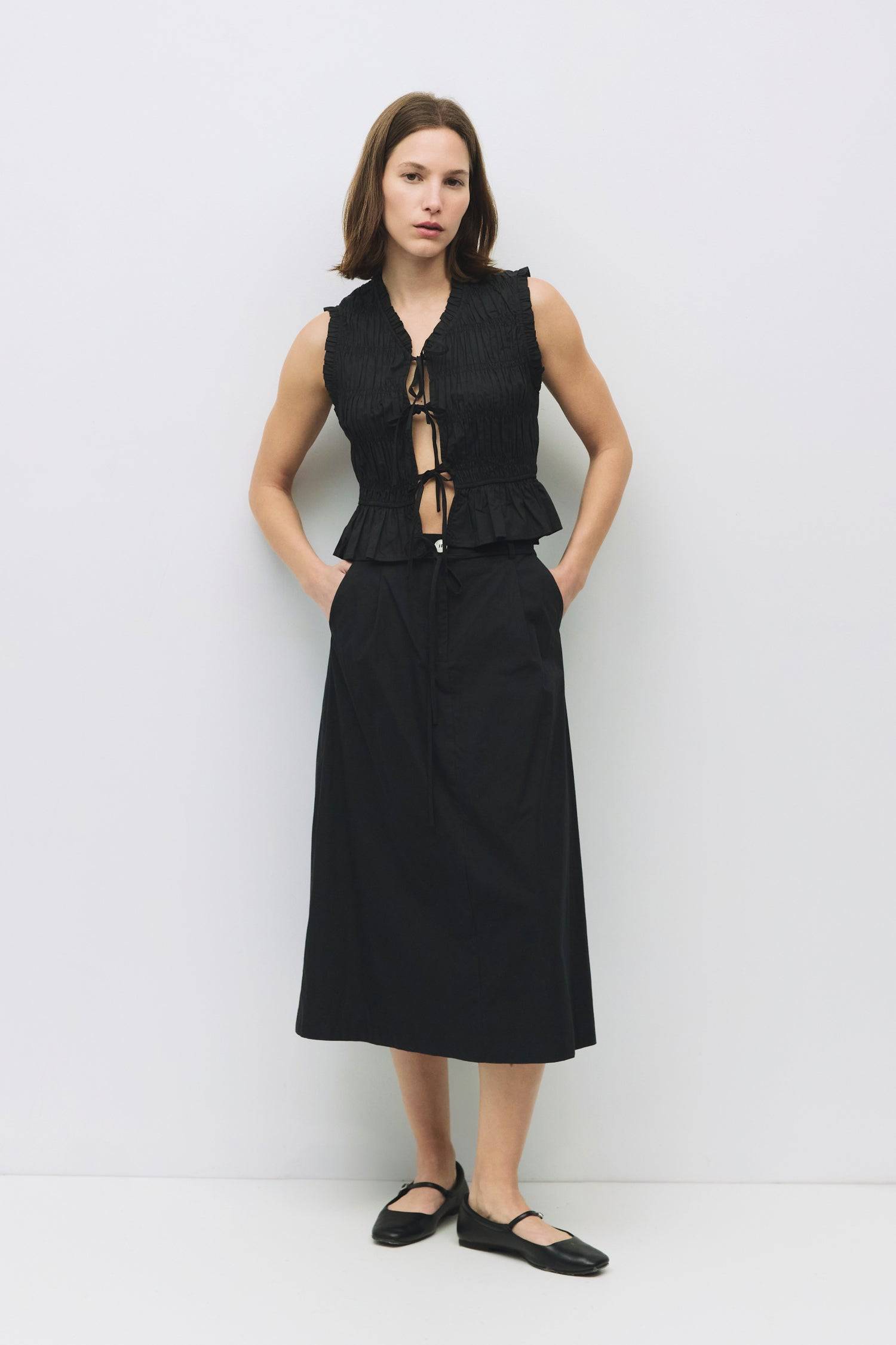 8929244872925, The Natasha Top, Tops, All Row, All Row,allrow,Black,Casual,cf-color-black,cf-color-white,cf-color-yellow,cf-size-l,cf-size-m,cf-size-s,cf-vendor-all-row,cinched,front ties,Long Sleeve,Long Sleeve Top,Matching Set,new,Ruffles,set,Sets,Spring,Summer,texture,white,Women's,womens top,Yellow, Information The Natasha Top is a charming sleeveless top with a V-neckline and front tie detailing. Featuring paneled shirring and ruffle accents around the neckline and sleeves, this top adds a playful touc