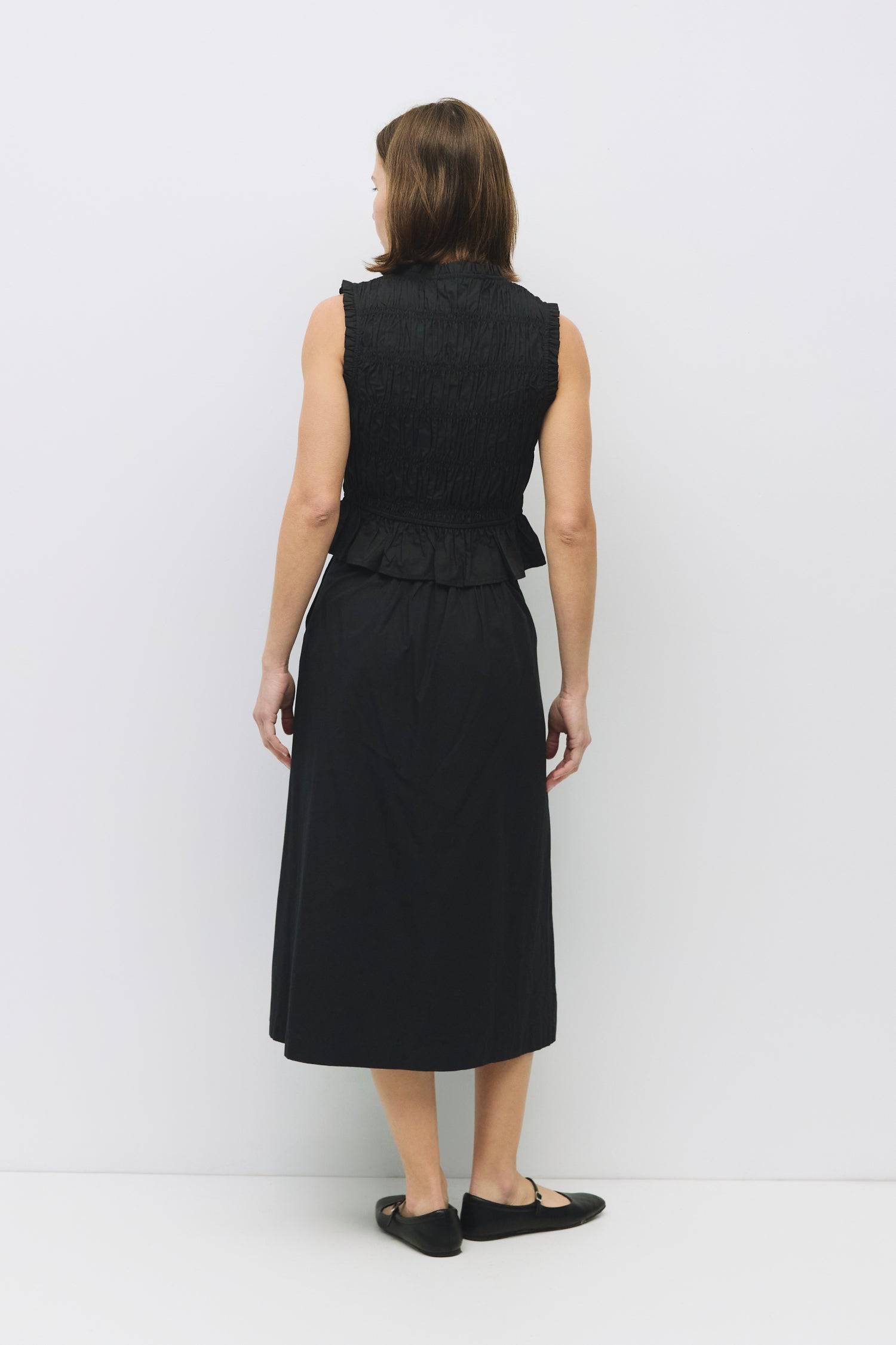 8929244872925, The Natasha Top, Tops, All Row, All Row,allrow,Black,Casual,cf-color-black,cf-color-white,cf-color-yellow,cf-size-l,cf-size-m,cf-size-s,cf-vendor-all-row,cinched,front ties,Long Sleeve,Long Sleeve Top,Matching Set,new,Ruffles,set,Sets,Spring,Summer,texture,white,Women's,womens top,Yellow, Information The Natasha Top is a charming sleeveless top with a V-neckline and front tie detailing. Featuring paneled shirring and ruffle accents around the neckline and sleeves, this top adds a playful touc