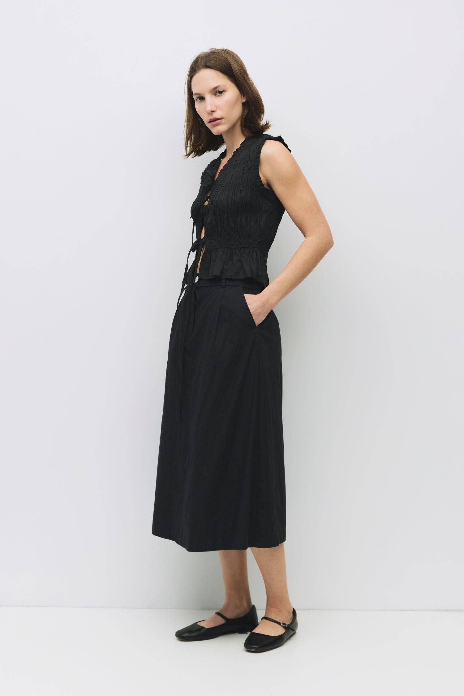 8929244872925, The Natasha Top, Tops, All Row, All Row,allrow,Black,Casual,cf-color-black,cf-color-white,cf-color-yellow,cf-size-l,cf-size-m,cf-size-s,cf-vendor-all-row,cinched,front ties,Long Sleeve,Long Sleeve Top,Matching Set,new,Ruffles,set,Sets,Spring,Summer,texture,white,Women's,womens top,Yellow, Information The Natasha Top is a charming sleeveless top with a V-neckline and front tie detailing. Featuring paneled shirring and ruffle accents around the neckline and sleeves, this top adds a playful touc